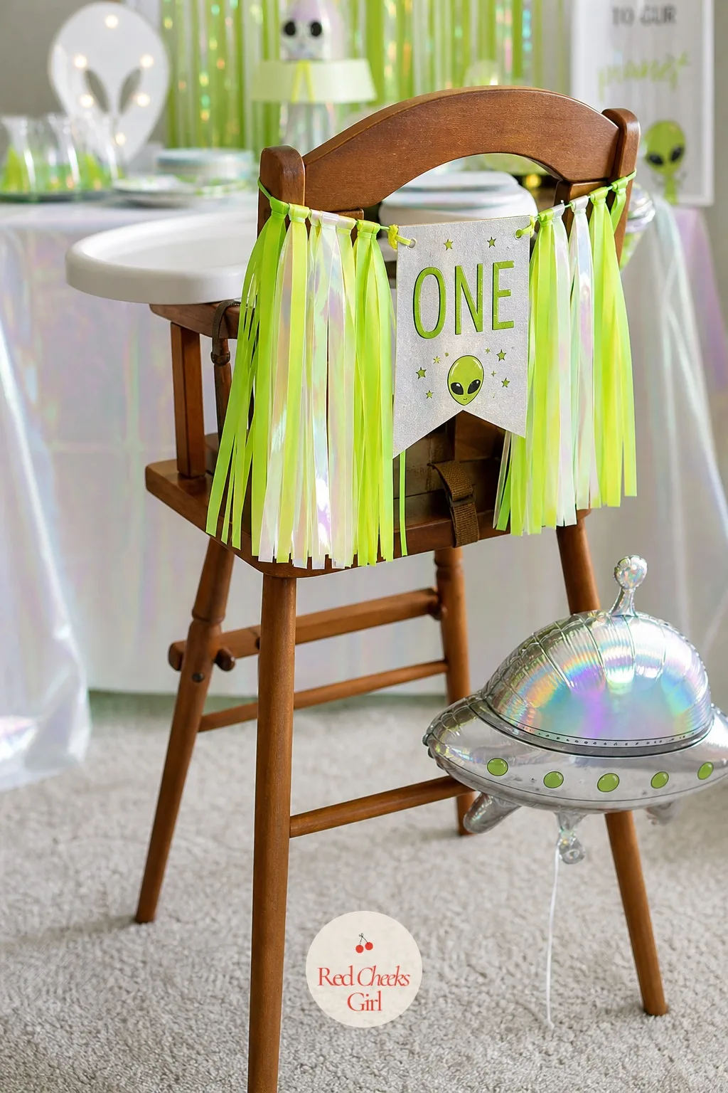 High Chair Banner — A plain high chair in the middle of every photo is hard to avoid and even harder to make look intentional. Alien first birthday party