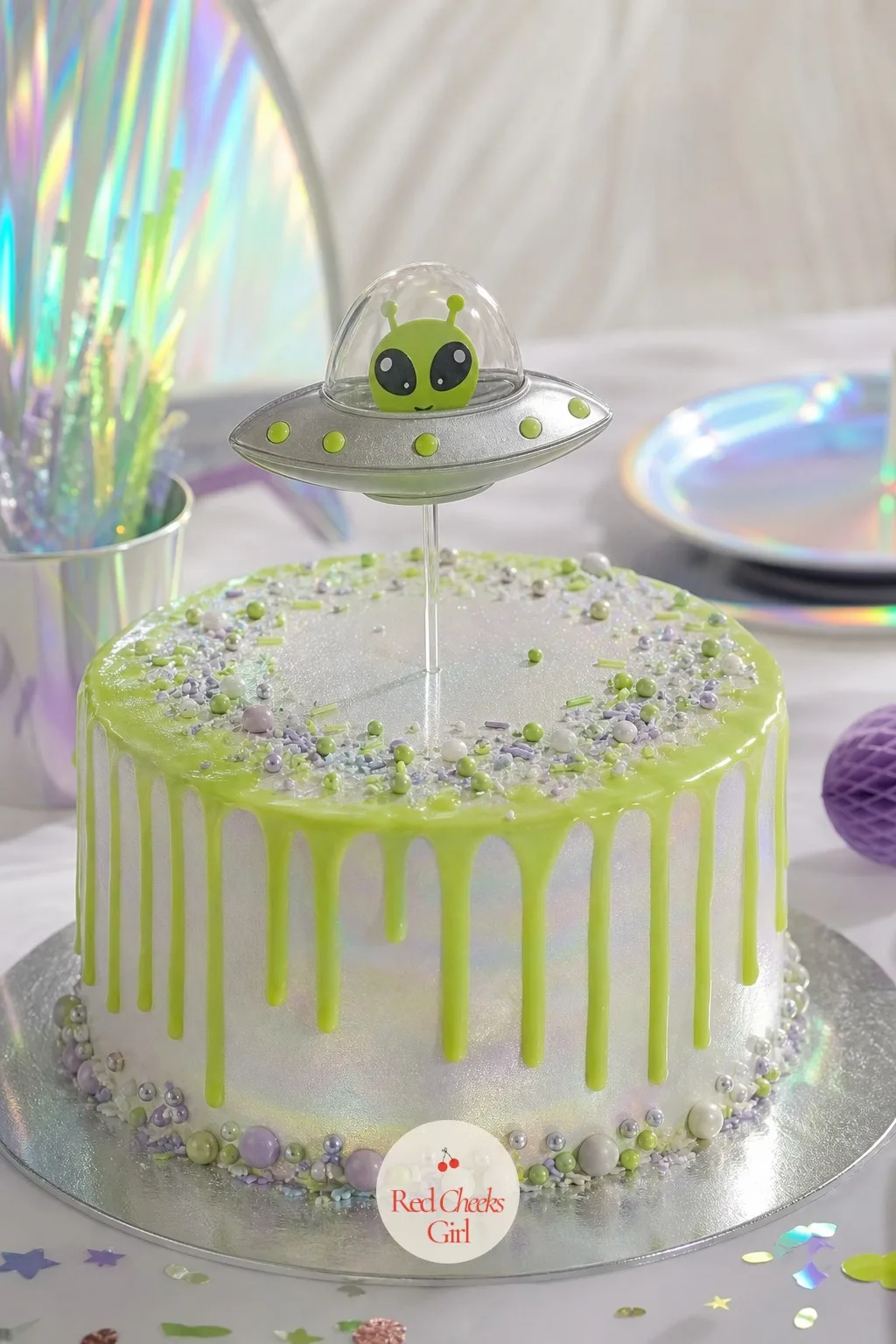 Smash Cake With UFO Topper — The smash cake photo is the one everyone actually wants, which is a lot of pressure for one small cake to carry. Alien first