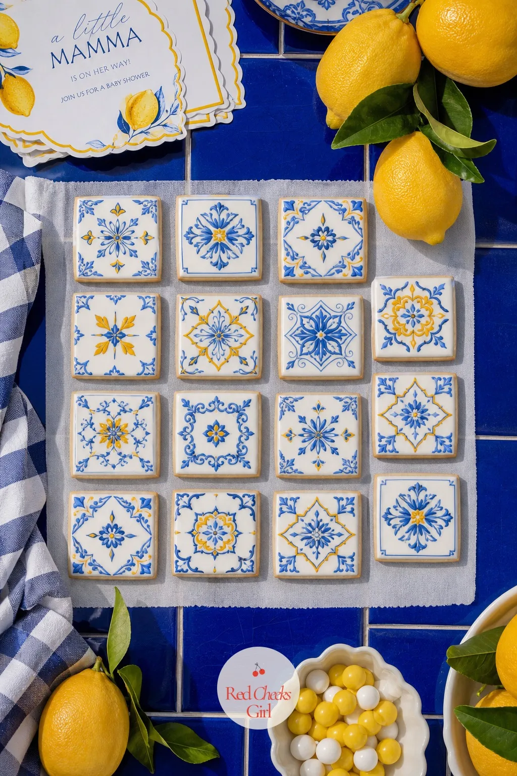 Amalfi Tile Iced Cookies — These start as plain square cut cookies, but the icing does all the talking: a repeating blue and white tile pattern flooded on, a