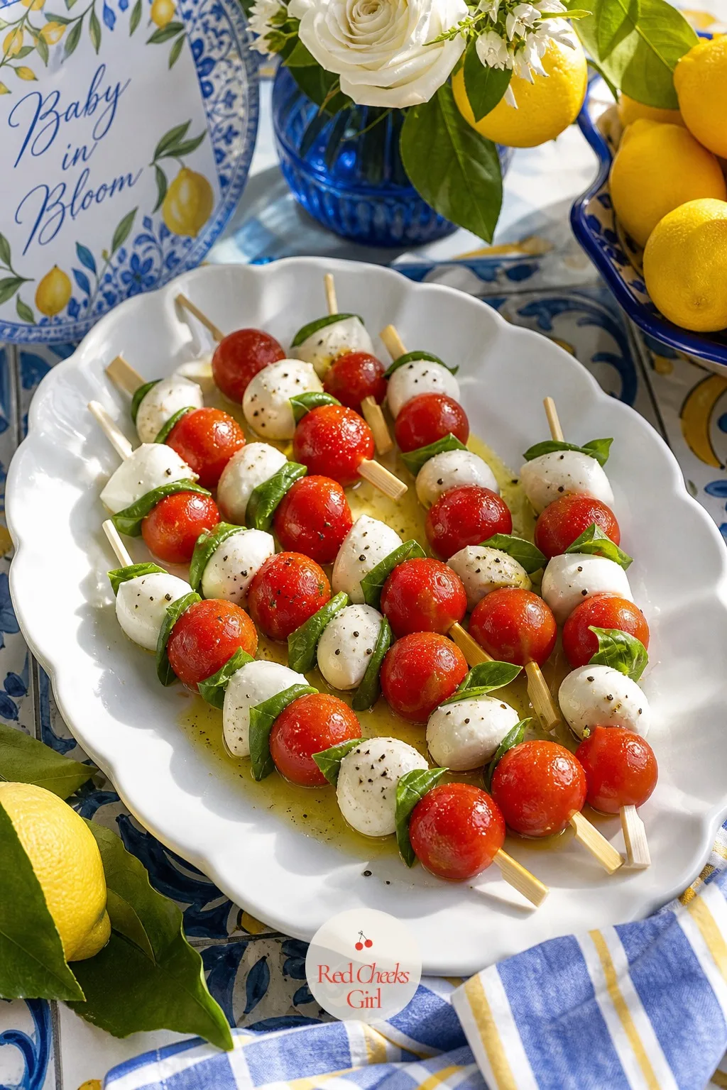 A Caprese Skewer Platter — Three ingredients, no cooking, and it still looks like it came from a trattoria. Amalfi coast baby shower theme