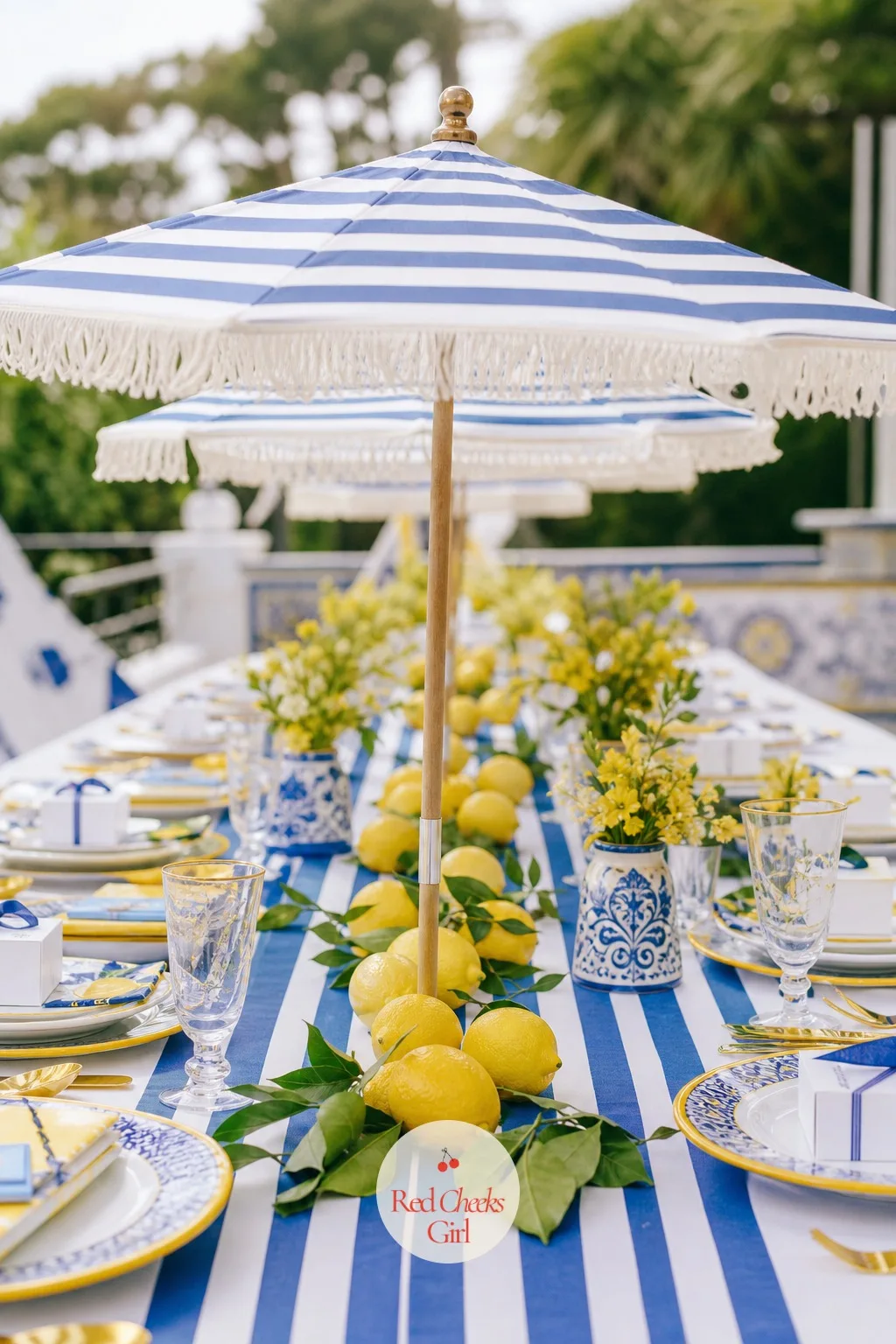 A Line of Striped Umbrellas down the Table — Flat tablescapes never quite capture the beach club feeling. Amalfi coast baby shower theme