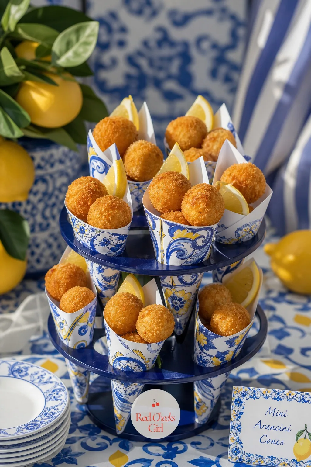 Mini Arancini Cones — Golden fried arancini balls hold their shape better standing up than piled flat. Amalfi coast baby shower theme