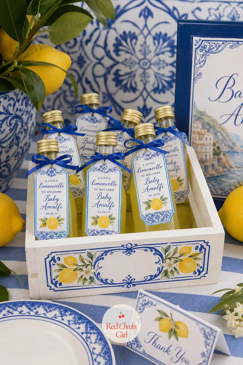 Mini Limoncello Bottle Favors — Small bottles of limoncello, or a non alcoholic lemon syrup for a dry party, stand clustered inside a wooden crate near the