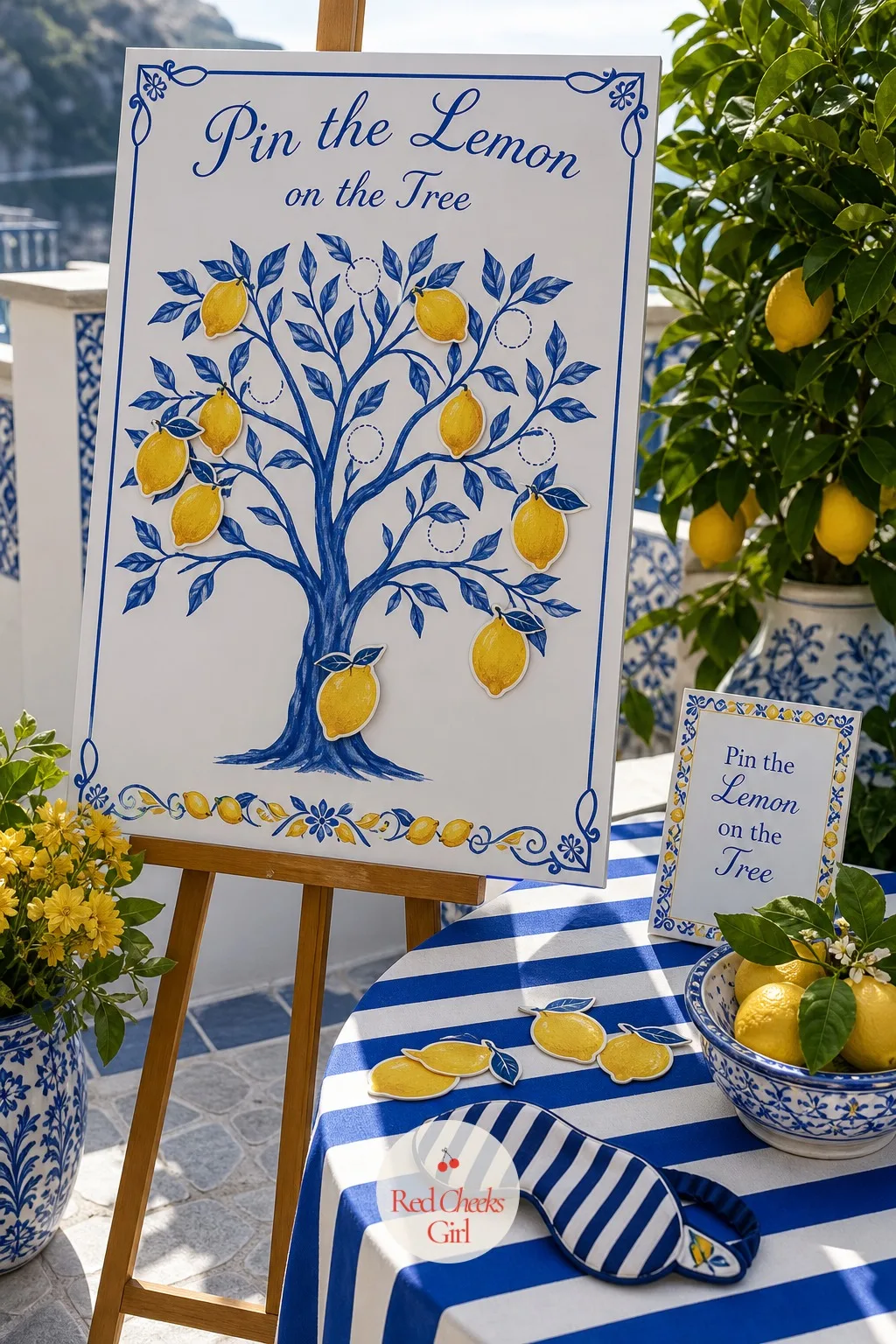 Pin the Lemon on the Tree — A large printed lemon tree poster stands on an easel, a few branch spots marked with small dots as the target. Amalfi coast baby