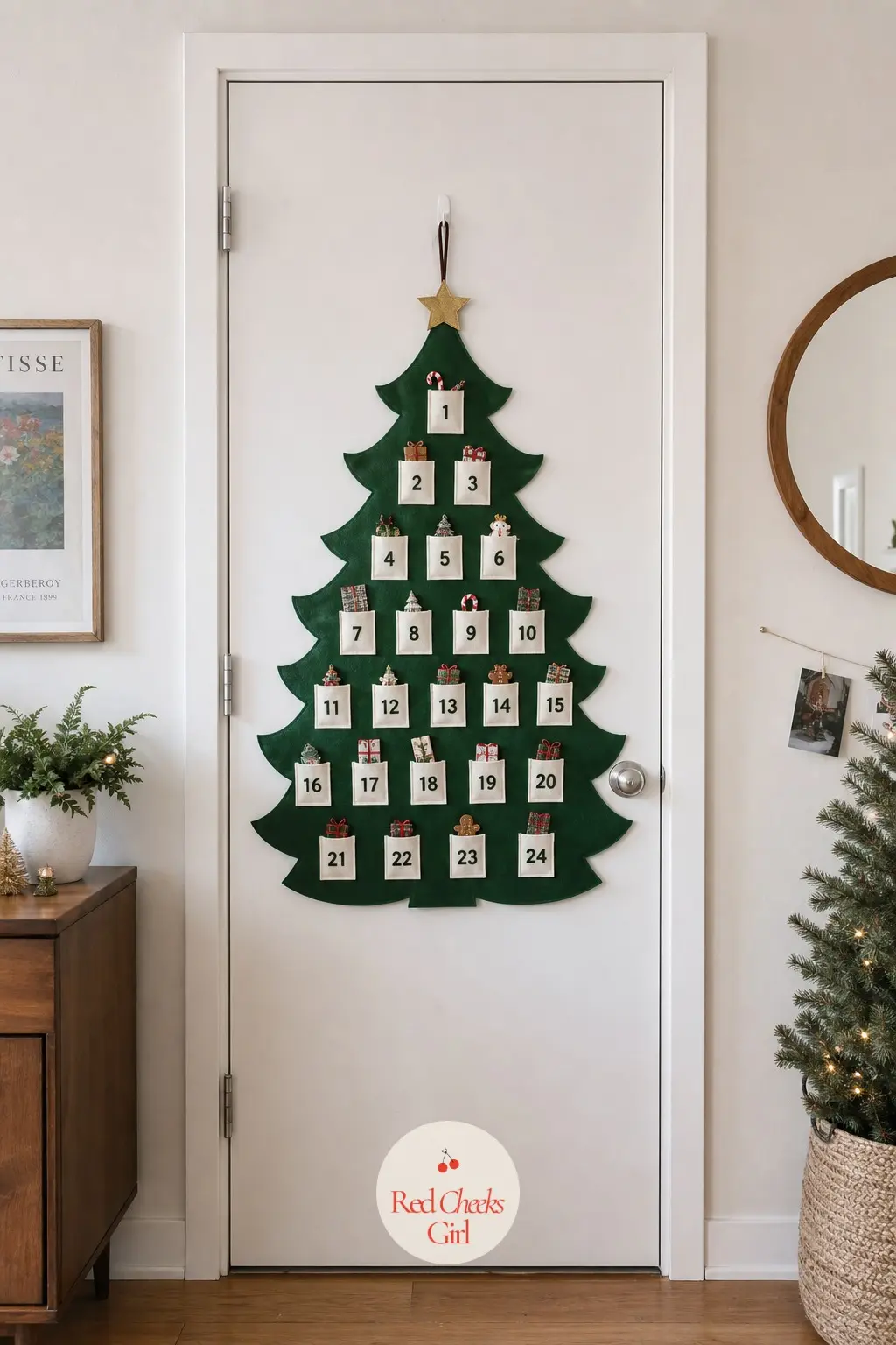 A Closet Door Hung With a Flat Felt Advent Calendar — A closet door usually sits blank all December, so a flat felt tree with numbered pockets puts it to use