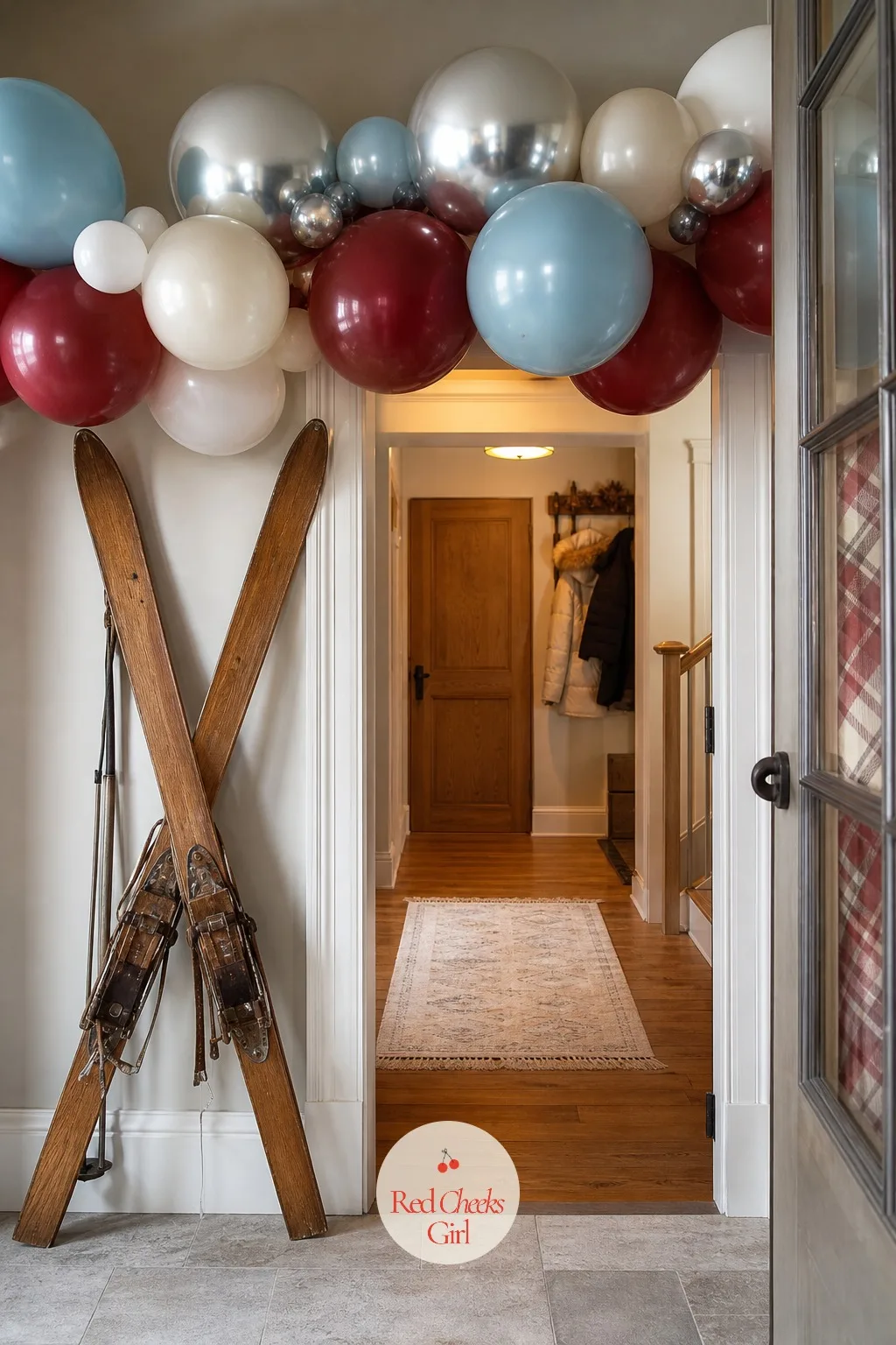 Crossed Skis and a Balloon Garland at the Door — Nobody should have to guess what kind of night this is before they even get their coat off. Apres ski party
