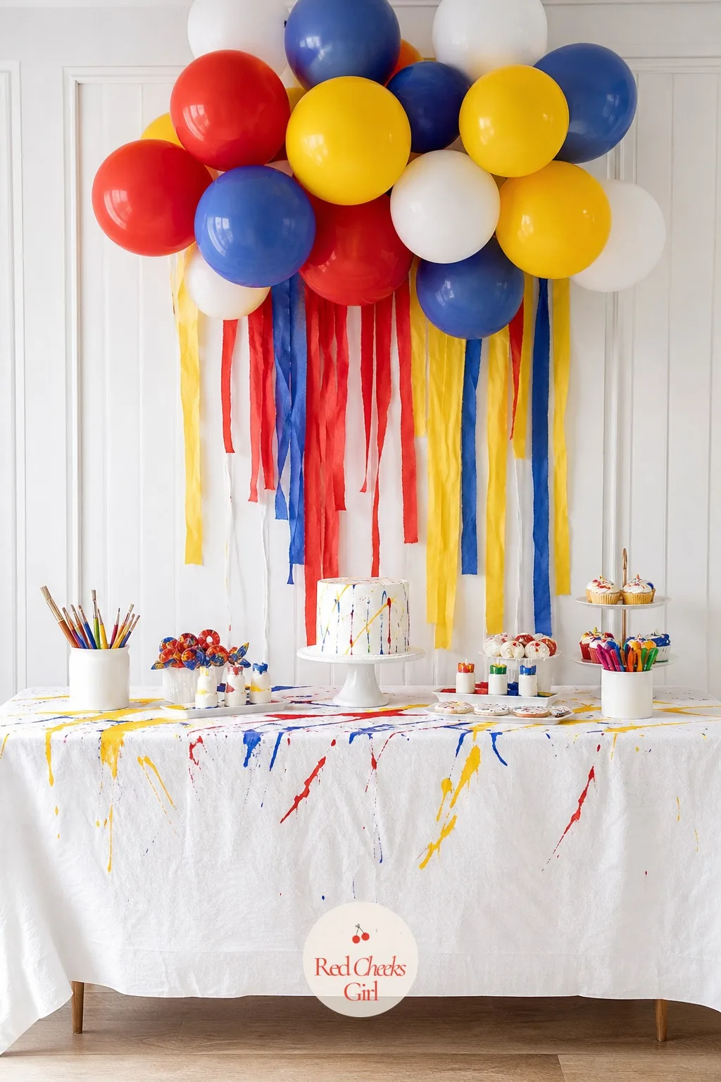 Dripping Paint Balloon Garland — For a doorway or wall that needs height rather than a flat print, a cluster of balloons does more work than a poster. Art