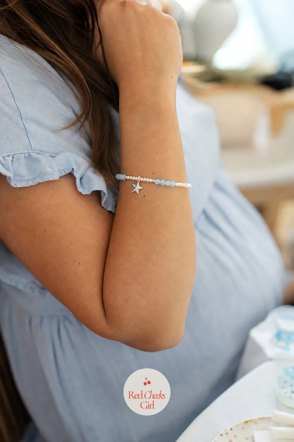 Charm Bracelet Making Bar — Quieter than a craft with paint, this one is mostly dishes of small beads and a conversation that drifts on while fingers stay