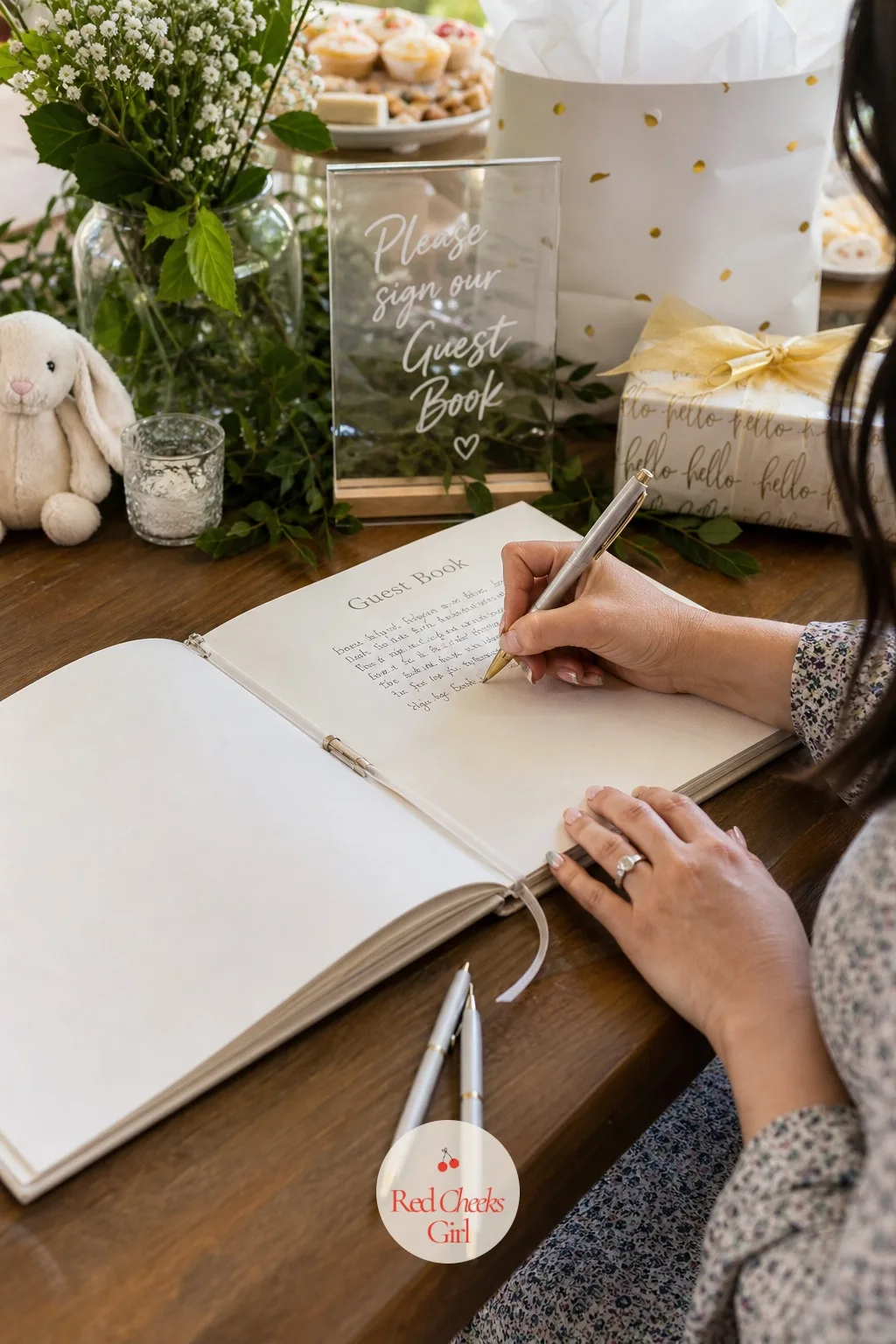 Guest Book Open on a Table — No line, no fuss, just a book left open to a blank page. Baby shower activities not games