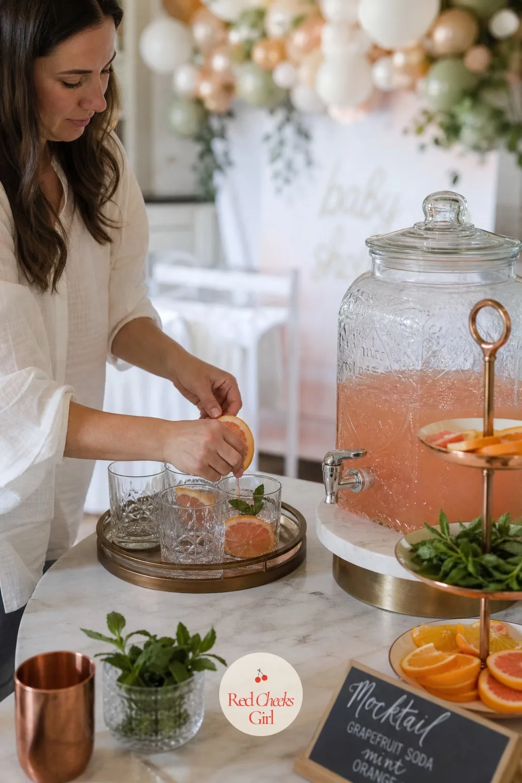 Mocktail Station — A dry bar sounds like a sad compromise until you see one actually laid out. Baby shower activities not games