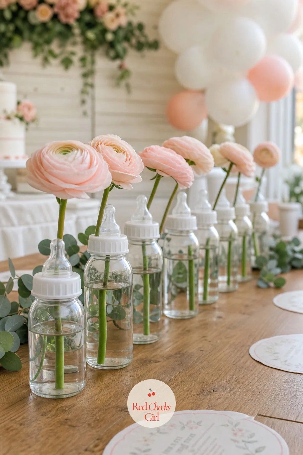 Baby Bottle Bud Vases — Clear glass baby bottles, the ones still in their packaging an hour ago, hold water and a single stem just as well as any florist vase