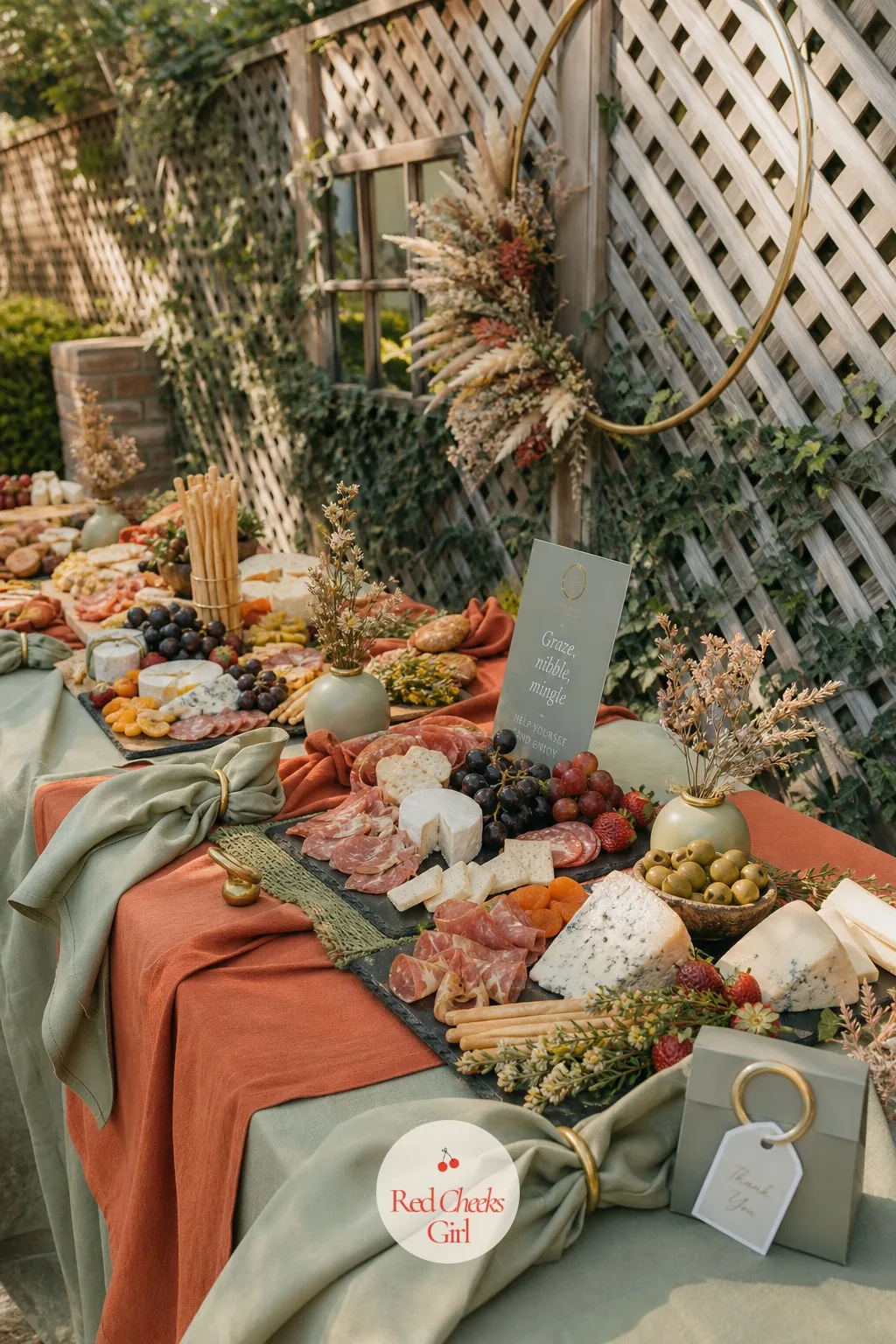 The Grazing Table — Guests graze instead of sitting down to a full plated meal, which suits a cocktail-hour engagement party far better than a seated dinner
