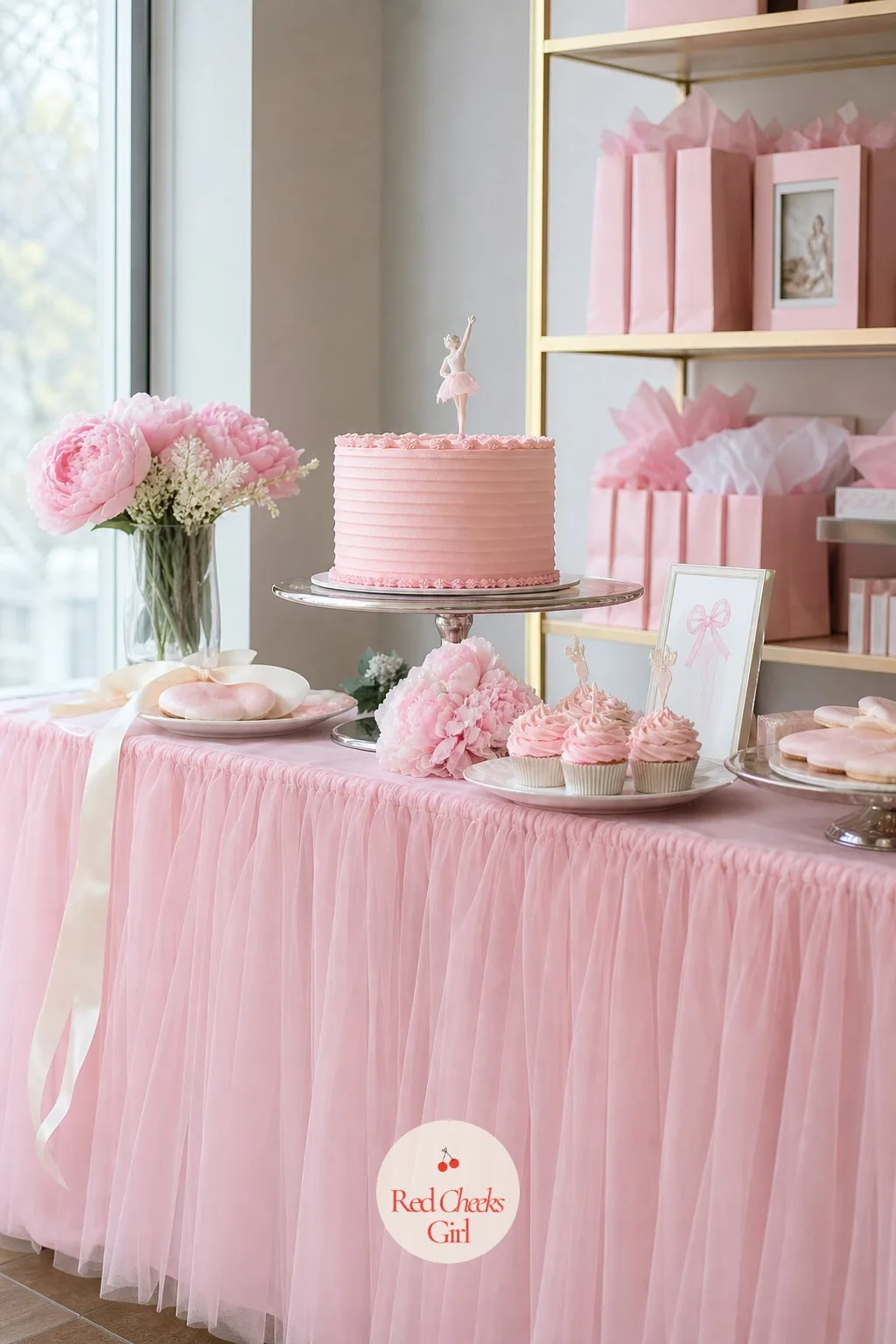 The Tulle-Skirted Dessert Table with a Pink Buttercream Cake — A folding table dressed in nothing looks exactly like what it is: a folding table. Ballerina
