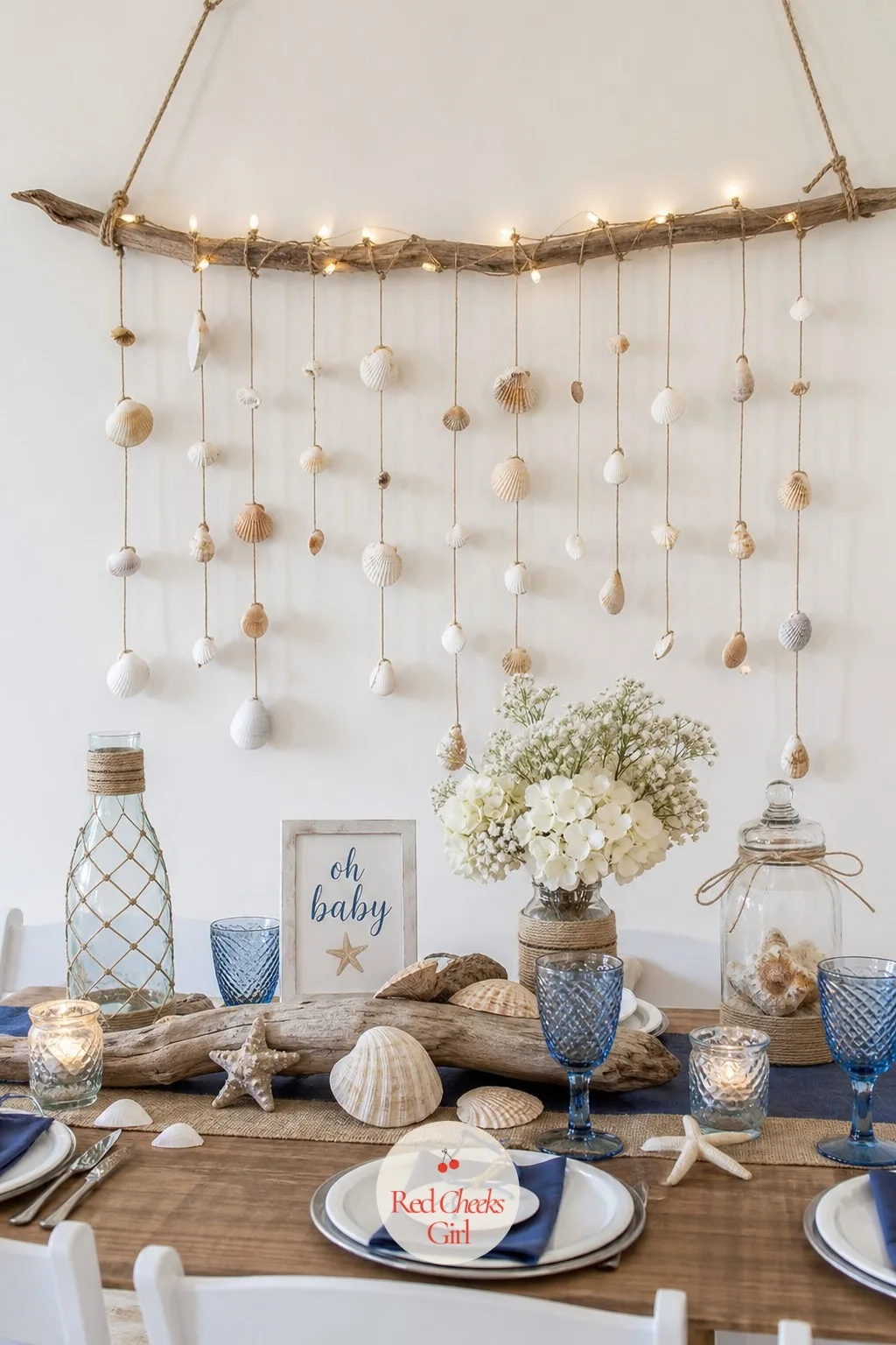 Driftwood Branch Wall Hanging — This fills a bare wall or the space above the gift table without any frame or text at all. Beach theme baby shower ideas
