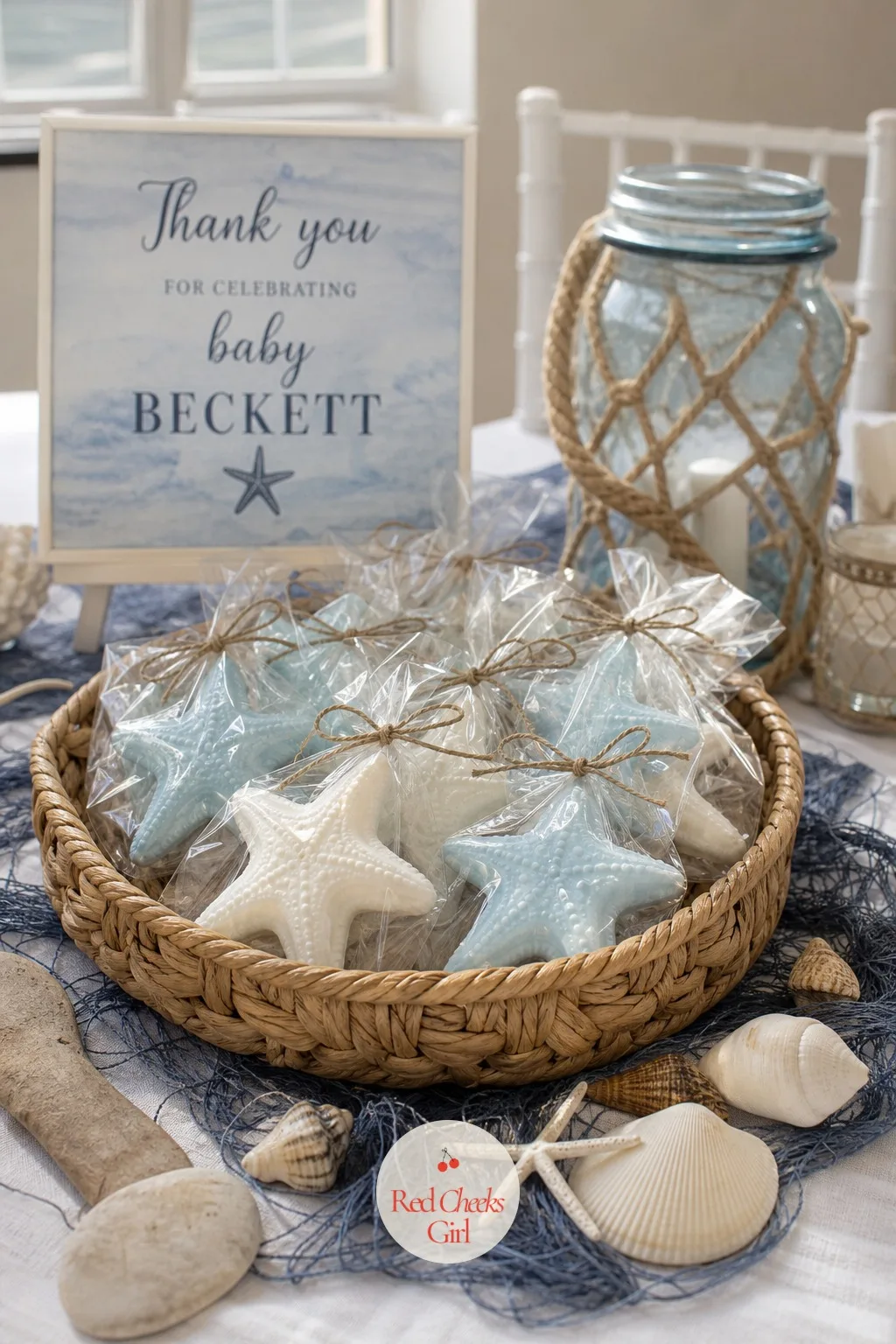 Starfish Soap Favors — Small bars of soap molded into a starfish shape, in soft white or pale blue, sit wrapped individually in clear cellophane and tied with