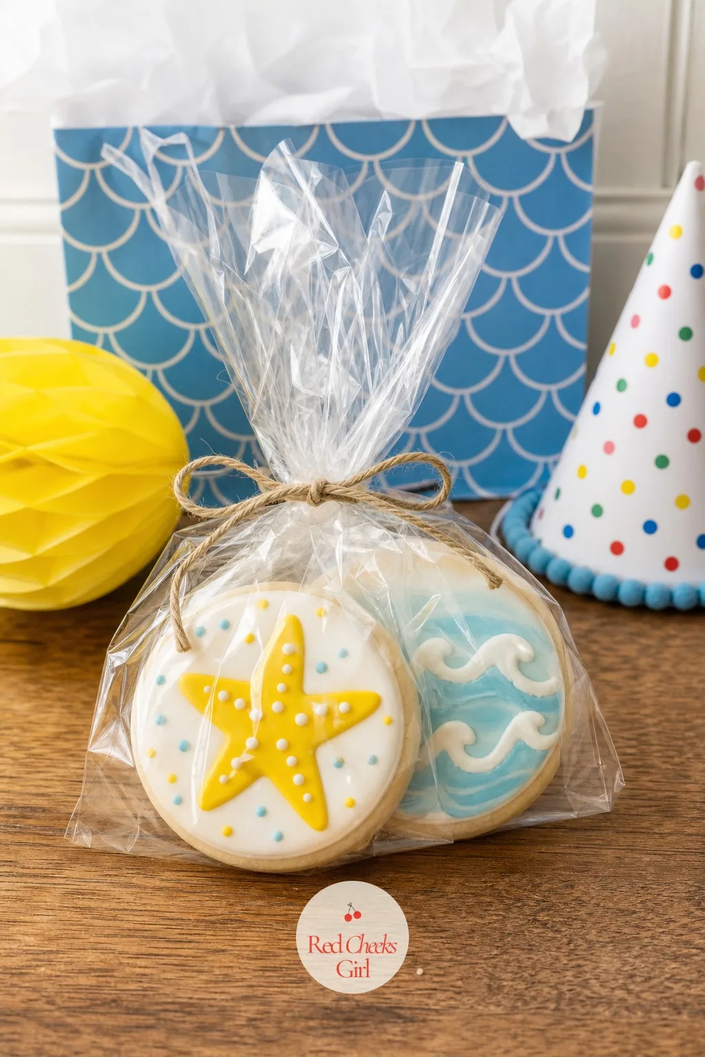 Decorated Cookies In A Clear Bag — A single cookie, iced properly and shown through a clear bag, reads as more thoughtful than a fistful of mixed candy ever