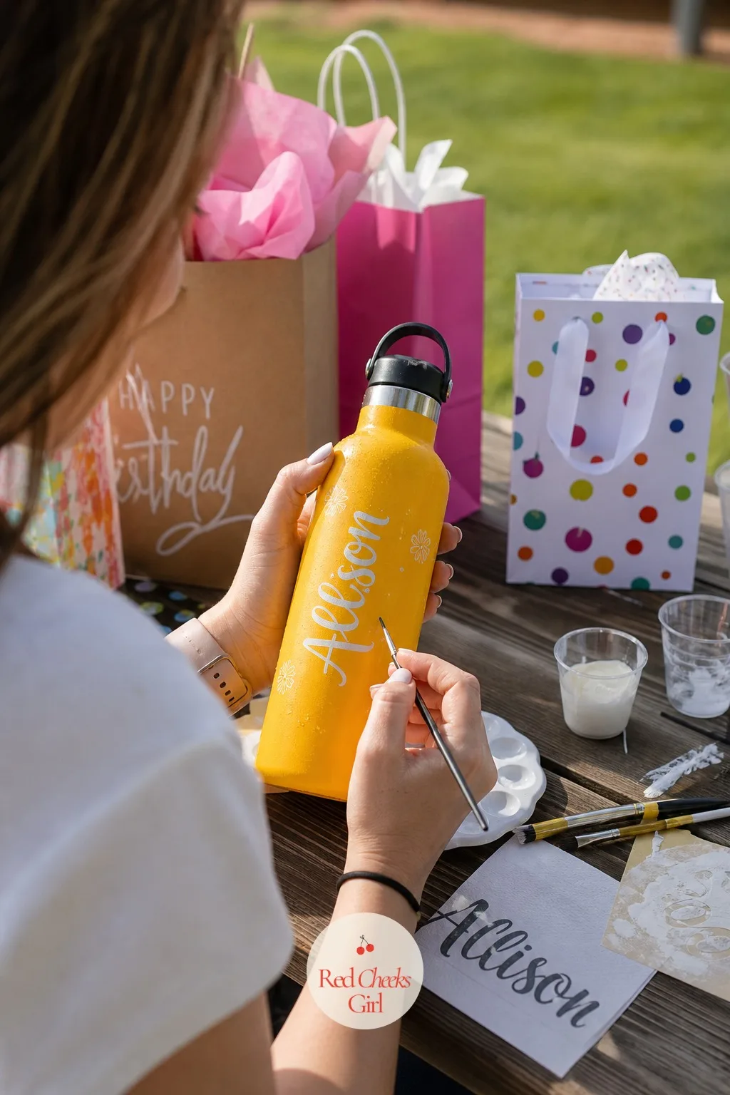 Reusable Water Bottle With Her Name Painted On — A juice cup that leaks in the car bag is not a gift, it is a hazard. Birthday party gift bag ideas