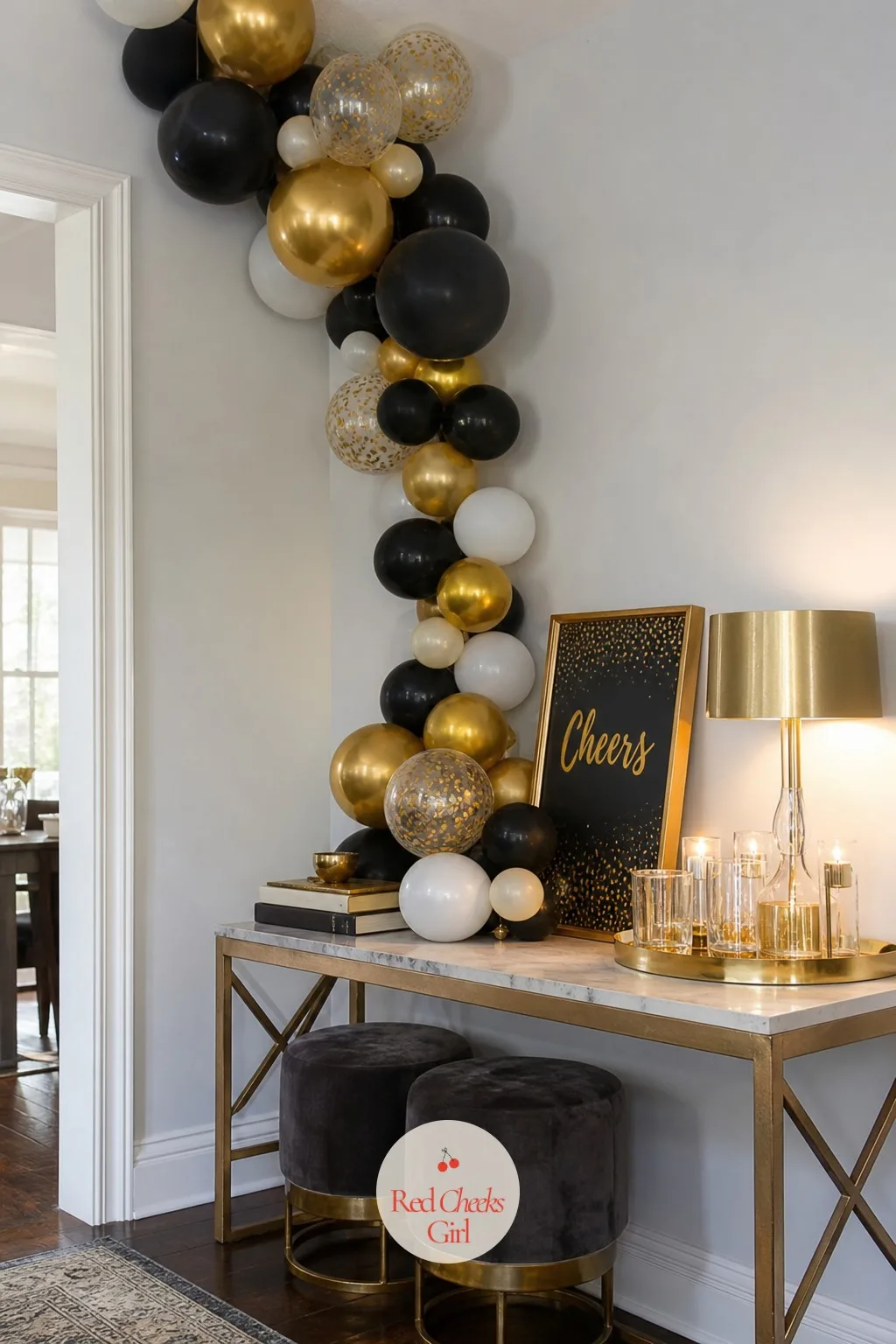 A Balloon Cascade Tumbling Down One Corner Onto a Console Table — Corners usually go undecorated and read as an afterthought once the main wall is finished.
