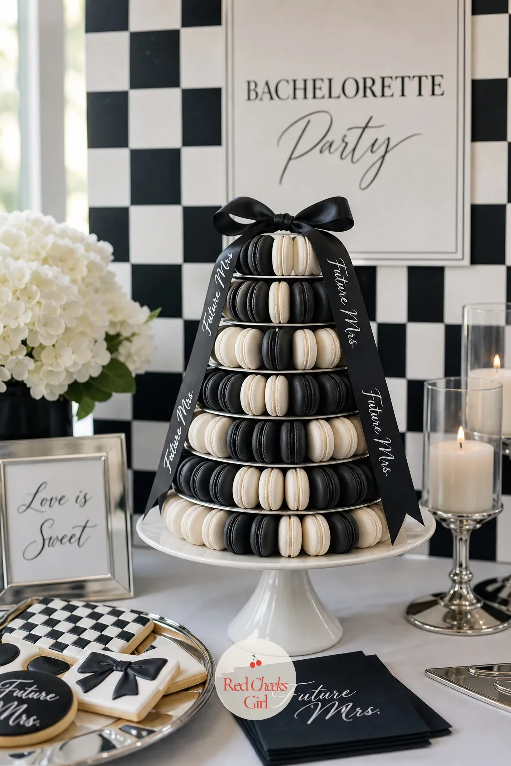 Black and White Macaron Tower — A dessert table with only cake and cookies on it starts to feel flat after the first round of photos. Black and white