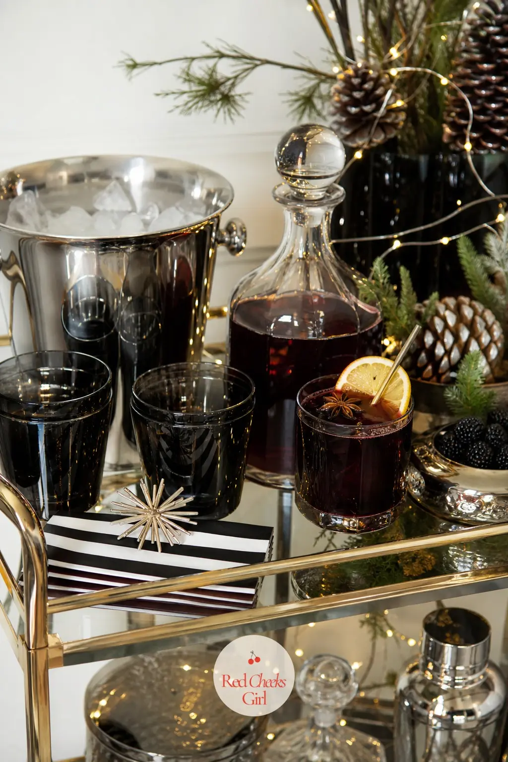 The Bar Cart, Poured for Mulled Wine in Black and White — The bar cart earns the same finish as the dining table because guests linger there longer: black