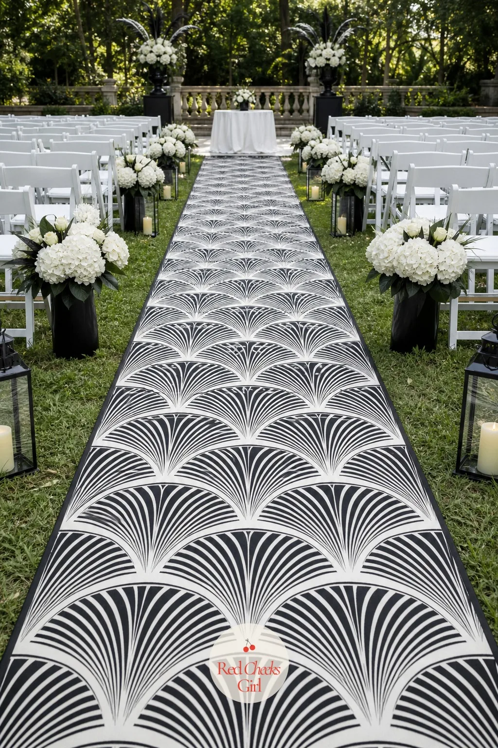 Art Deco Fan Aisle Runner — A plain white runner photographs as an afterthought once guests are already seated. Black and white wedding decor
