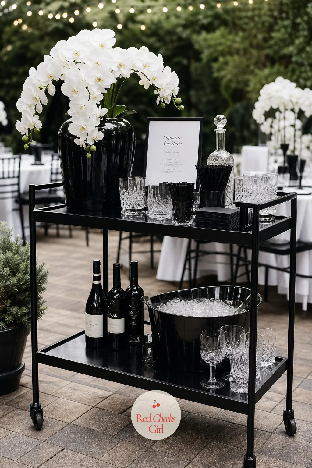 Black Bar Cart with White Orchids — A bar built from rented straight sections can look a little flat on its own. Black and white wedding decor