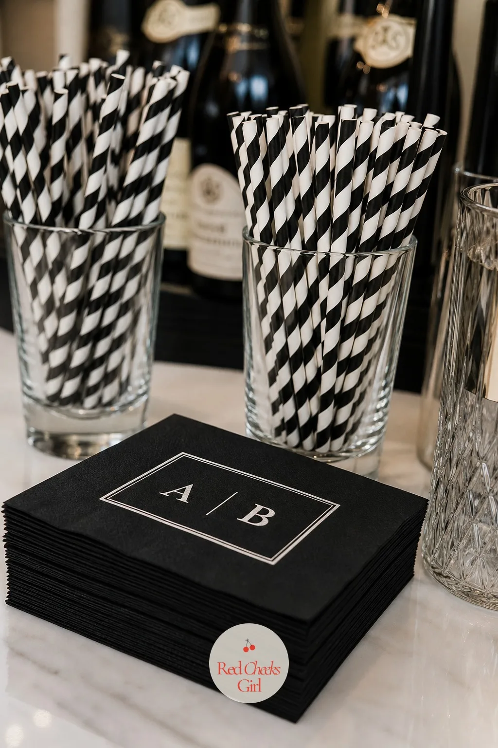 Monochrome Cocktail Napkins and Striped Straws — The smallest details at a bar are usually the first ones guests actually pick up and hold. Black and white