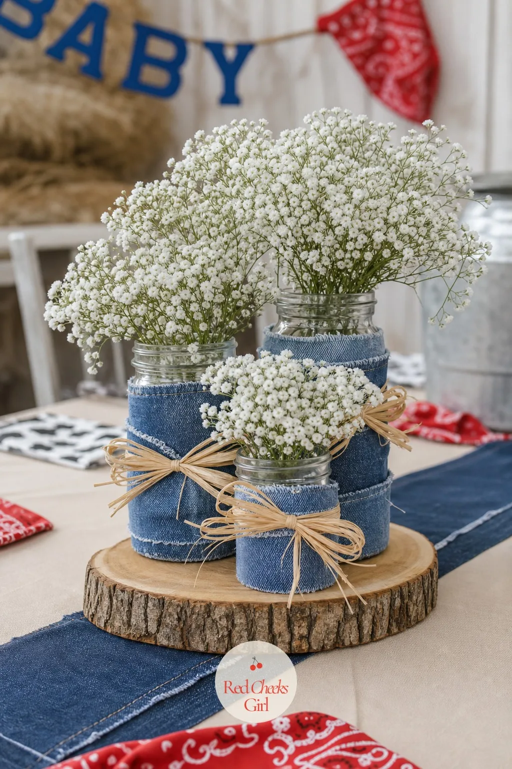 Mason Jar Wildflower Centerpiece — A table with nothing low and soft on it feels stark no matter how good the linens are. Blue jean baby shower theme