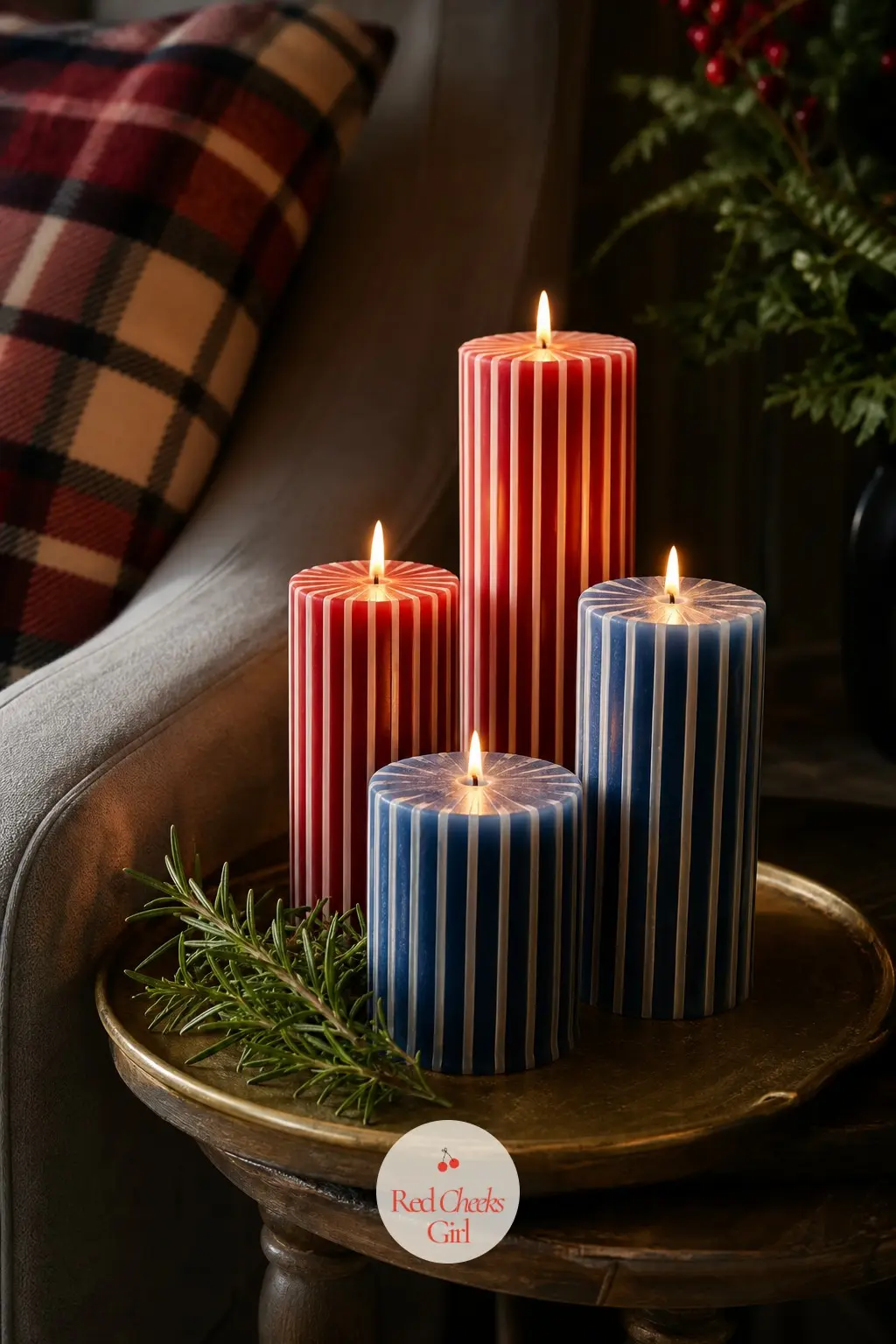 The Side Table, Set With a Cluster of Striped Pillar Candles — A small side table beside the armchair holds a cluster of pillar candles in varying heights