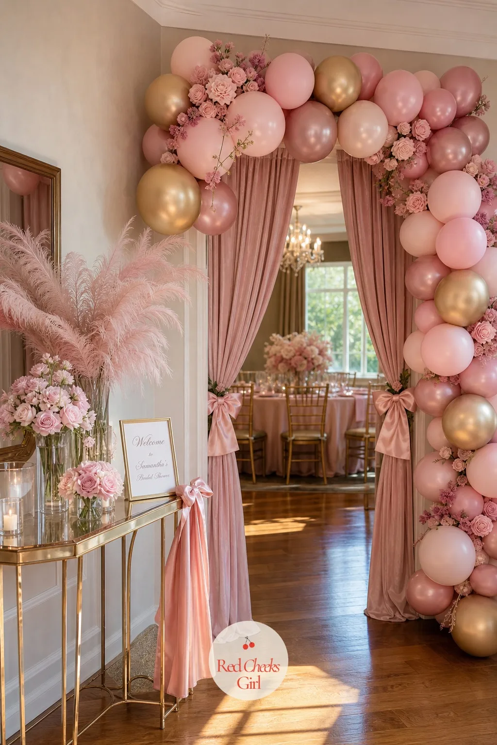 Pink and Soft Gold Balloon Arch at the Entrance — The front door or the entry to the room needs its own small moment, something that tells a guest she is in