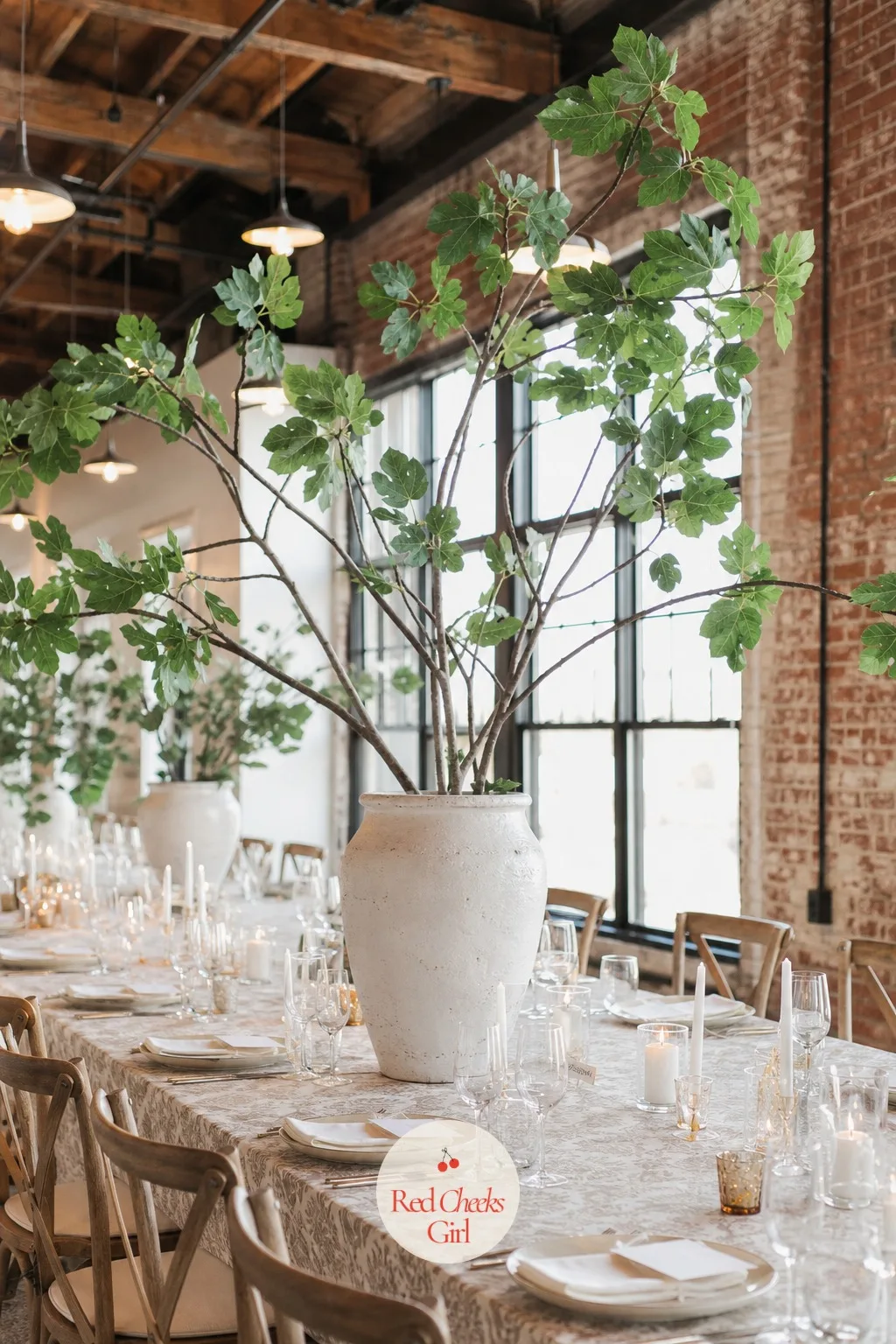 Fig Branches in Oversized Vases — Small arrangements disappear on a table built for twelve. Boho wedding centerpieces