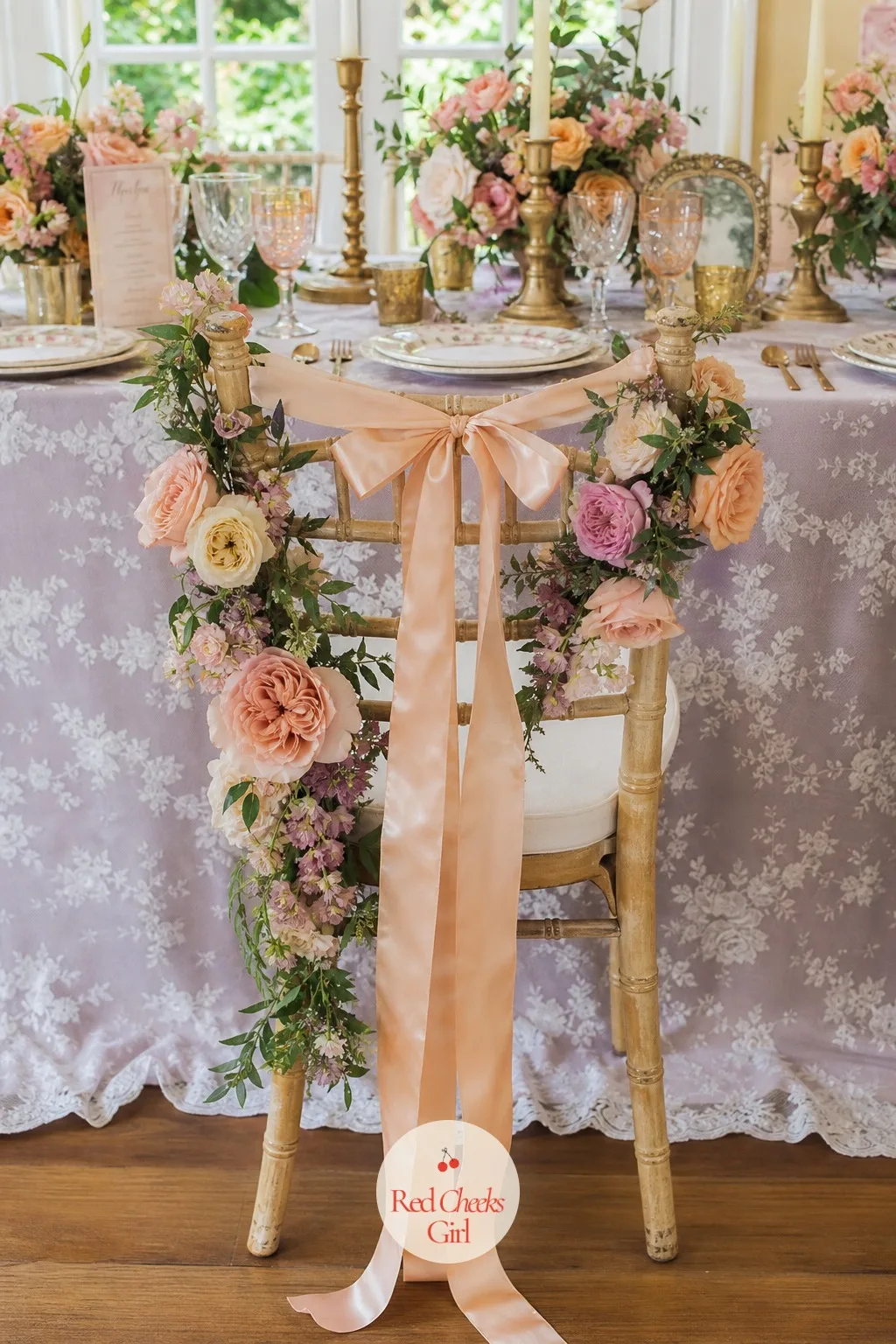 Bride's Chair Dressed in Flowers and Ribbon — Every other seat at the table is a plate and a napkin. Bridal shower decorations