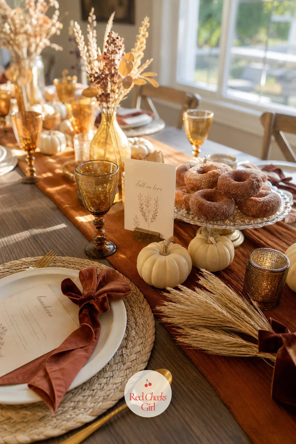 Fall Harvest — Amber and rust rather than orange, mini pumpkins left unpainted and unstacked, dried wheat stalks tied in small bundles with velvet ribbon