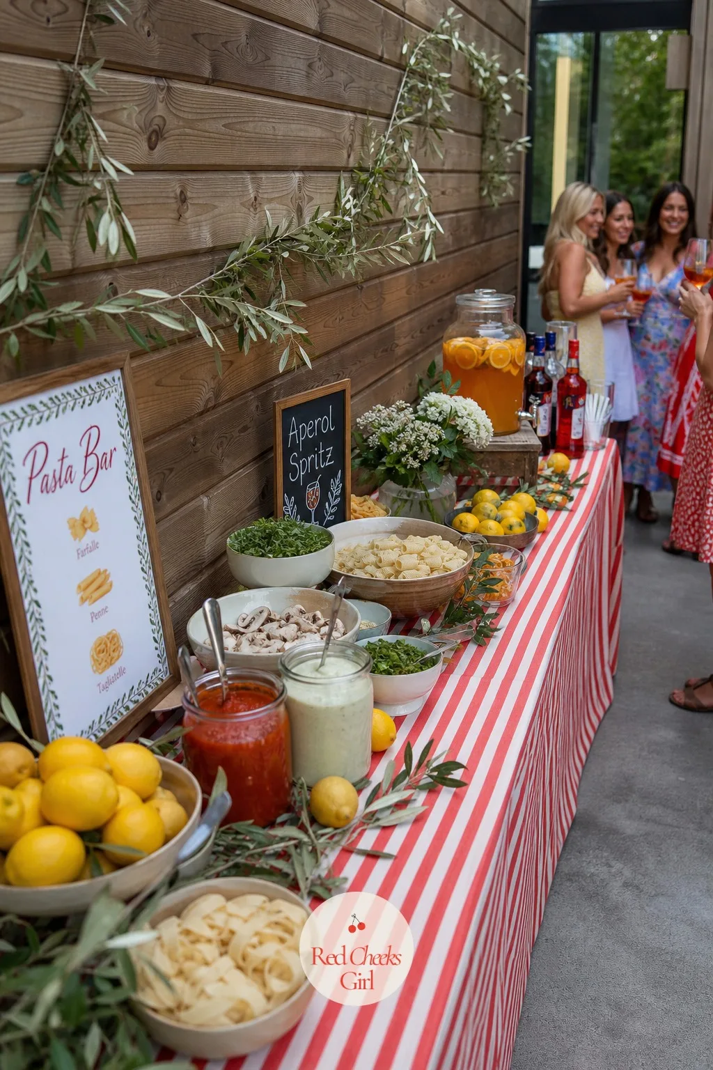 Italian Summer — Olive branches instead of flowers, a red and white striped runner instead of anything floral, lemons left whole in a bowl at the centre: this