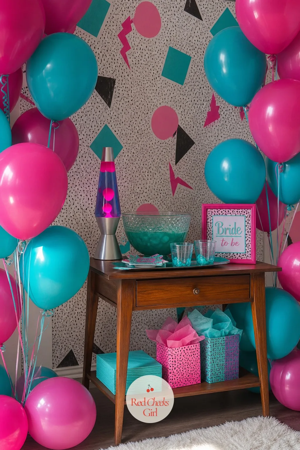 Nineties Fuchsia and Turquoise — Loud, on purpose: fuchsia and turquoise balloons bunched together rather than a single long garland, a lava lamp on the side