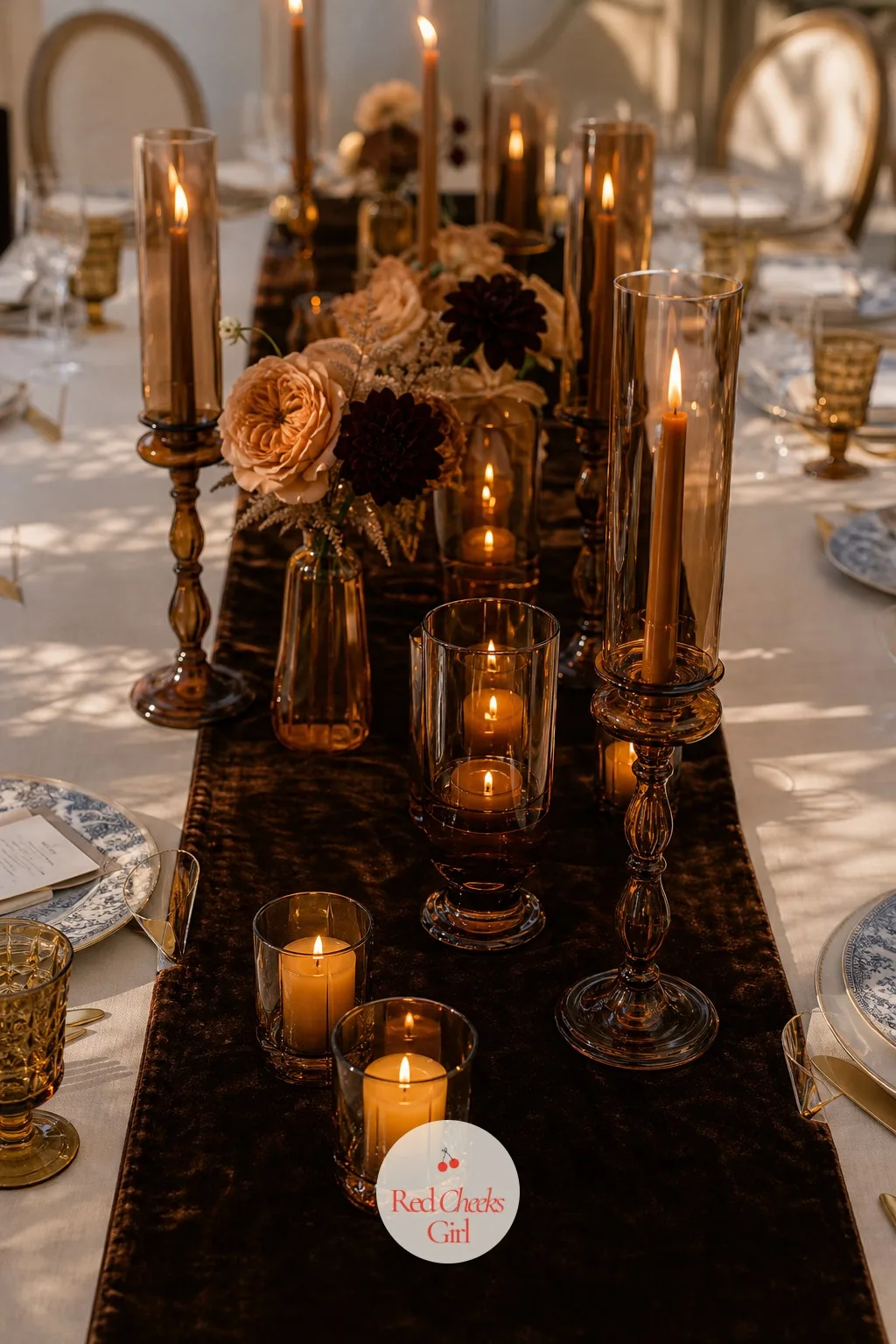 Amber Glass Candle Holders Down the Table Spine — These march down the center of the table between the florals, catching candlelight the color of caramel