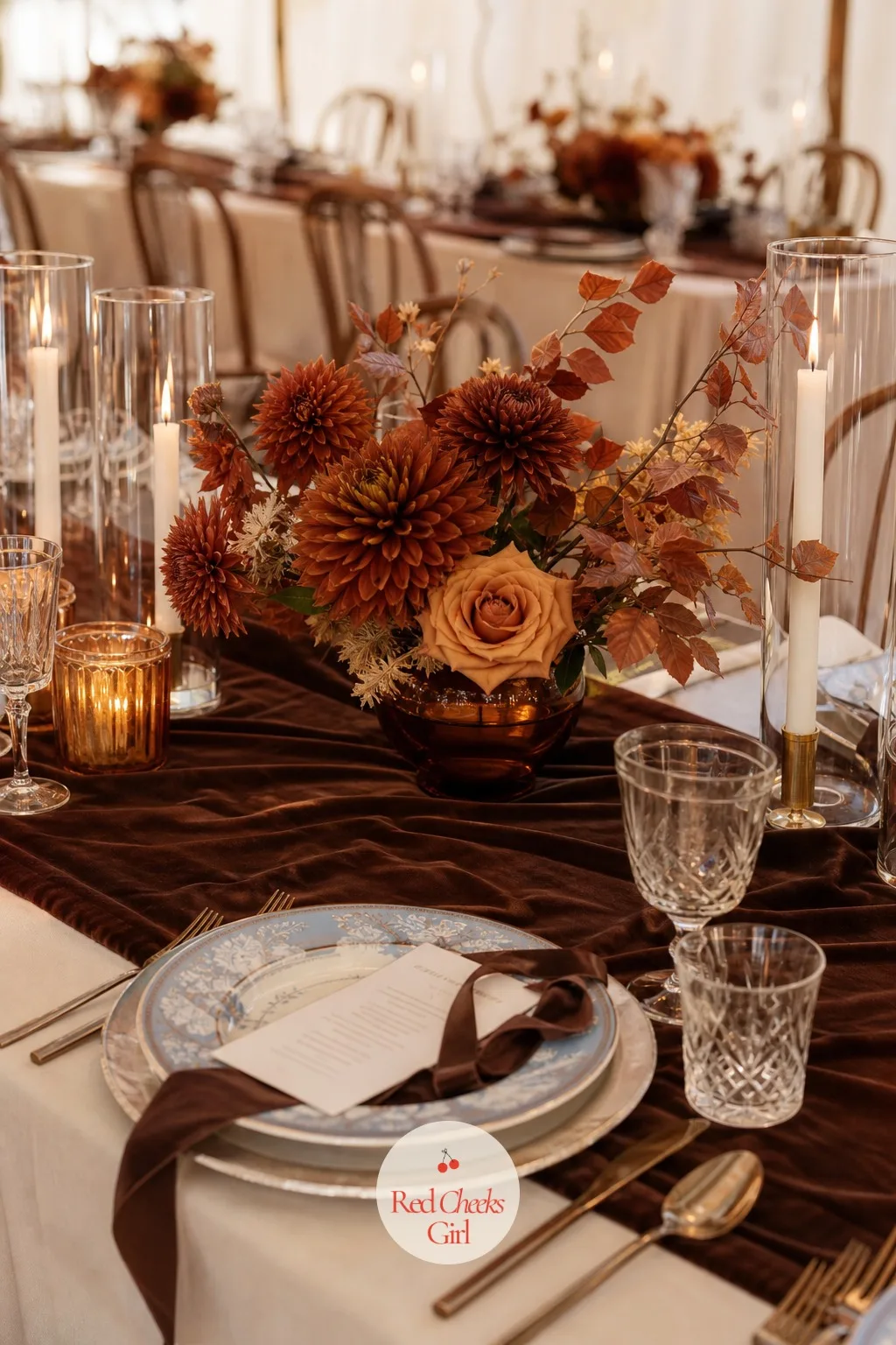 Low Centerpieces of Brown Dahlias in Amber Glass Vases — Set between the candle clusters, these stay low enough that guests can still see each other across the