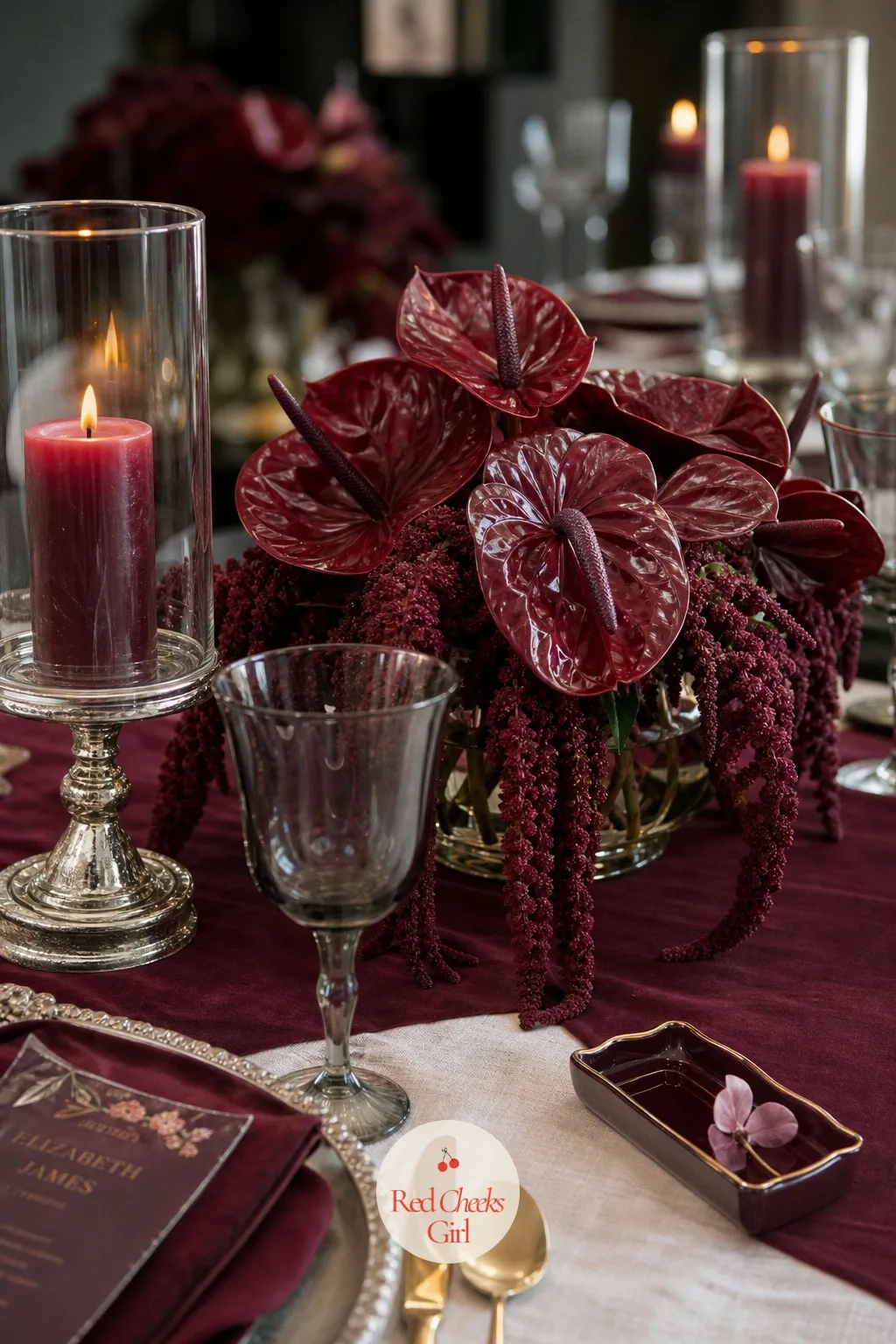 Deep Red Anthurium and Amaranthus Centerpiece — Round, polished anthurium next to long trailing amaranthus gives a centrepiece two different textures without