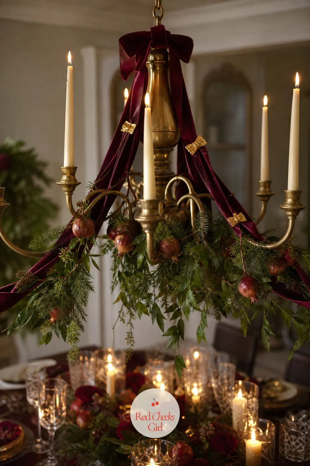 The Dining Room Chandelier, Wound in Velvet Ribbon — Burgundy velvet ribbon winds down from the chandelier arms, caught at intervals with gold clips so it