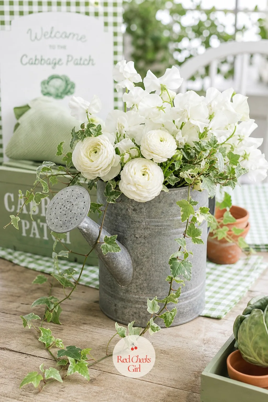 Galvanized Watering Can Flower Arrangement — A watering can says vegetable garden more honestly than any amount of printed signage. Cabbage patch baby shower