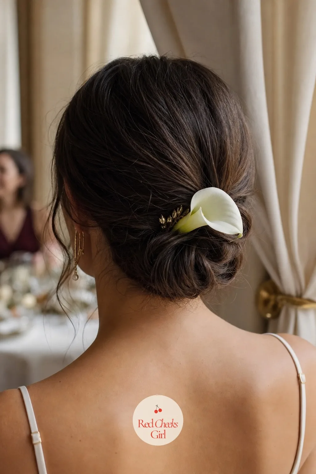 A Calla Lily Hair Comb for the Bride — A single small calla, tucked into an updo or veil comb, is the one place the flower touches the bride herself rather