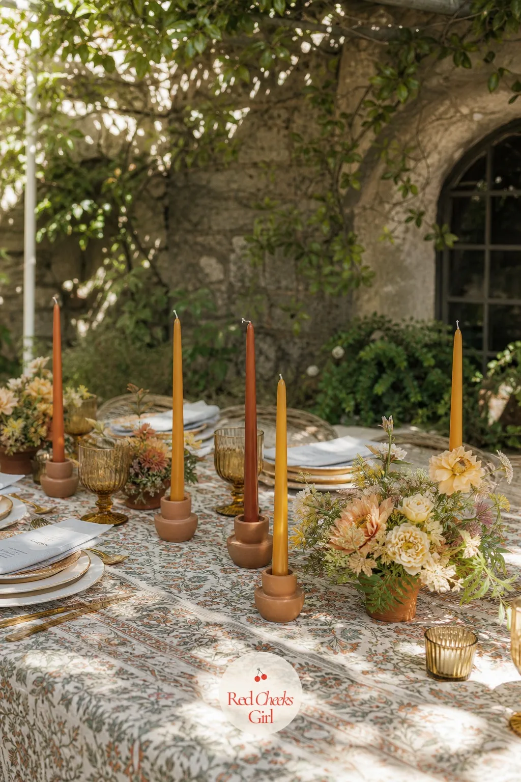 Colored Taper Candles in Terracotta Holders — White tapers are safe. Candle wedding centerpieces