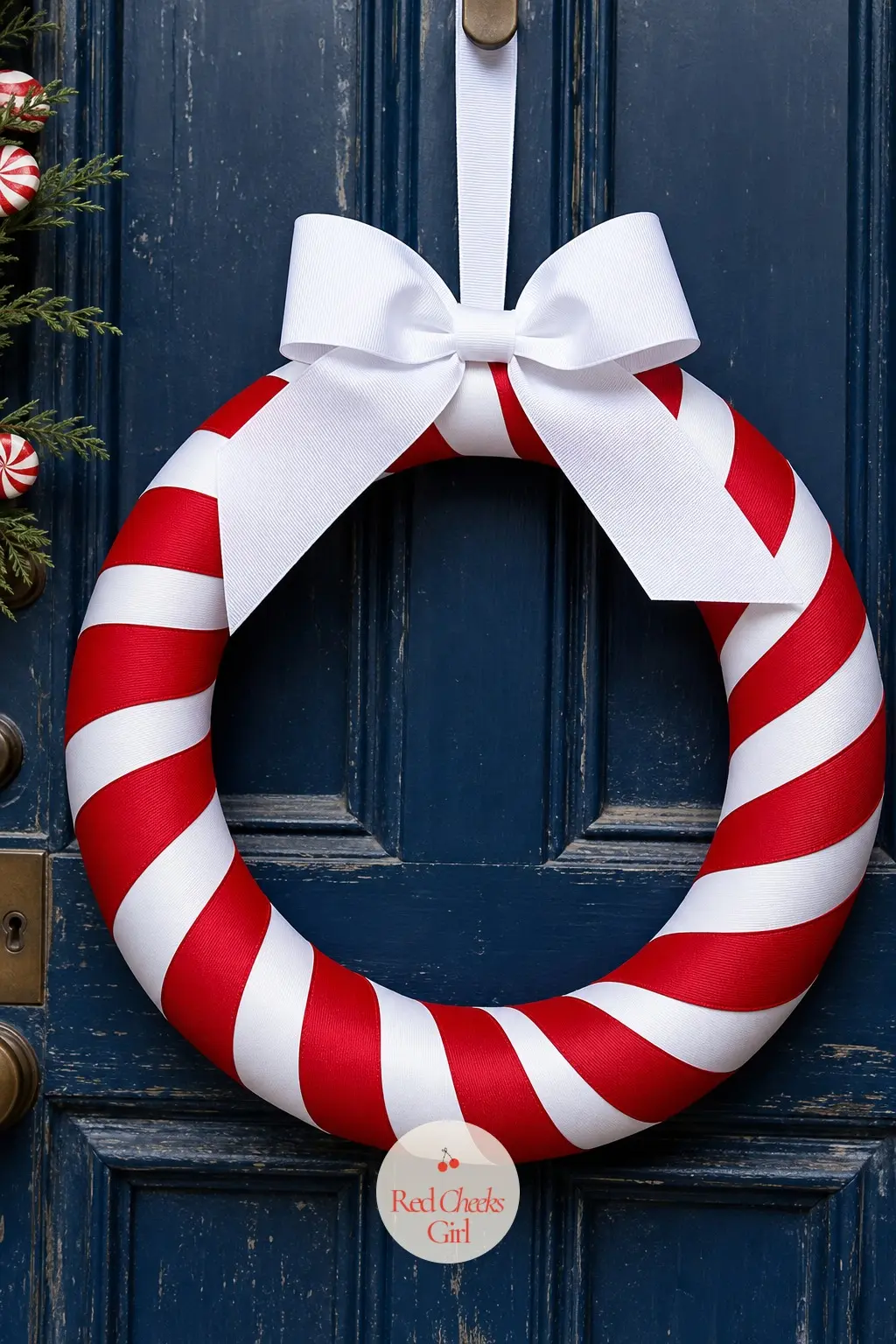 A Wide Grosgrain Ribbon Spiral Wreath for the Front Door — Wide red and white grosgrain wound tight and overlapping around a hidden wire form reads as one