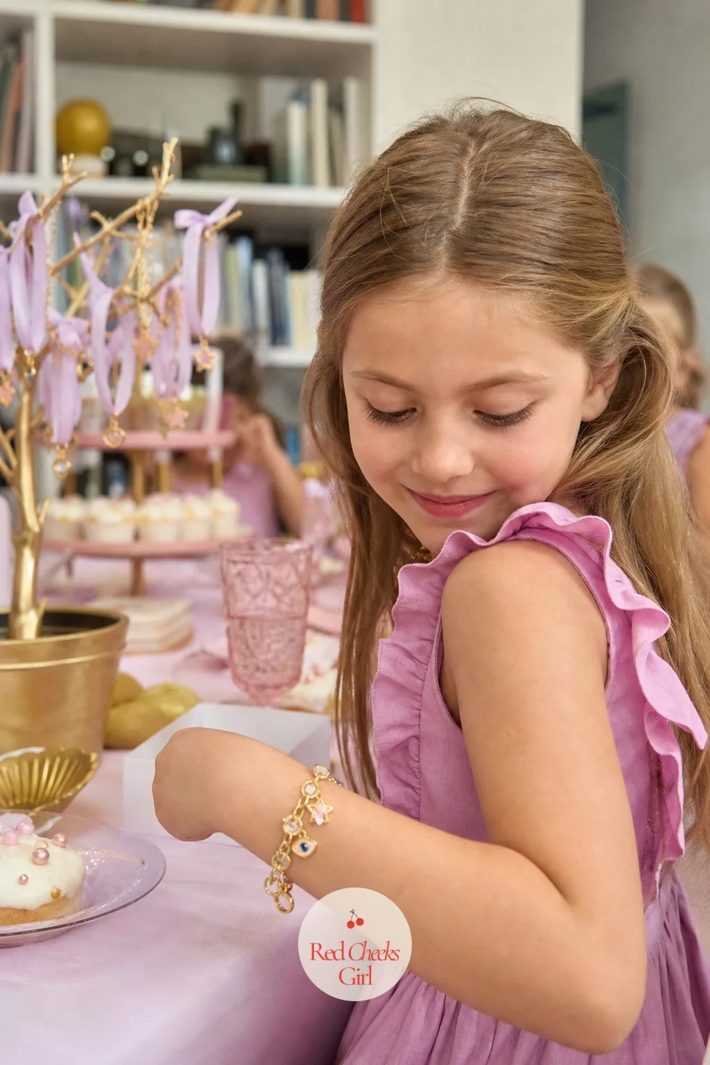 The Ribbon Bracelet Tree — A finished bracelet laid flat on a table disappears into the tablecloth. Charm bracelet party