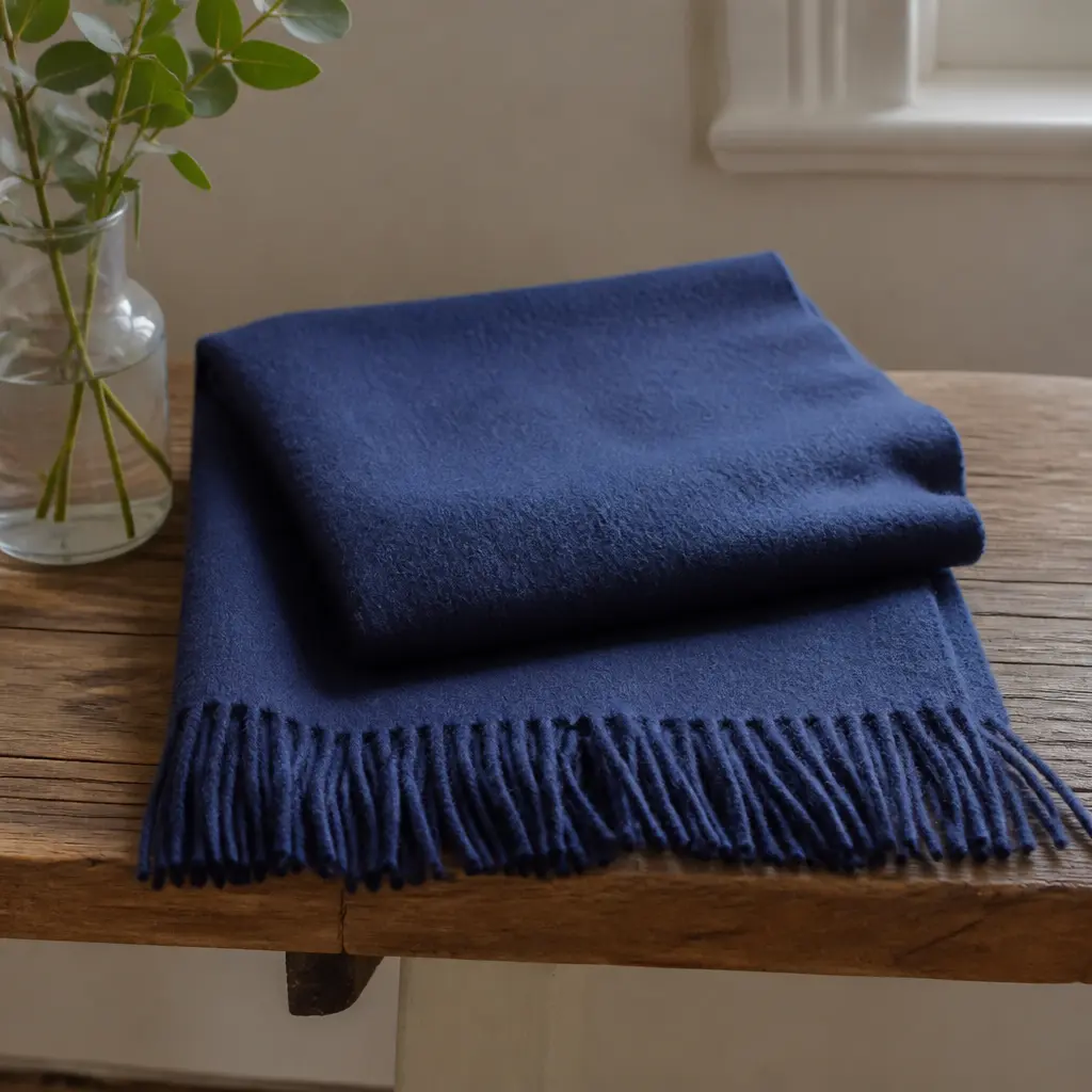 Lambswool Scarf — The scarf he owns is thin and does nothing against real wind. Cheap christmas gift ideas