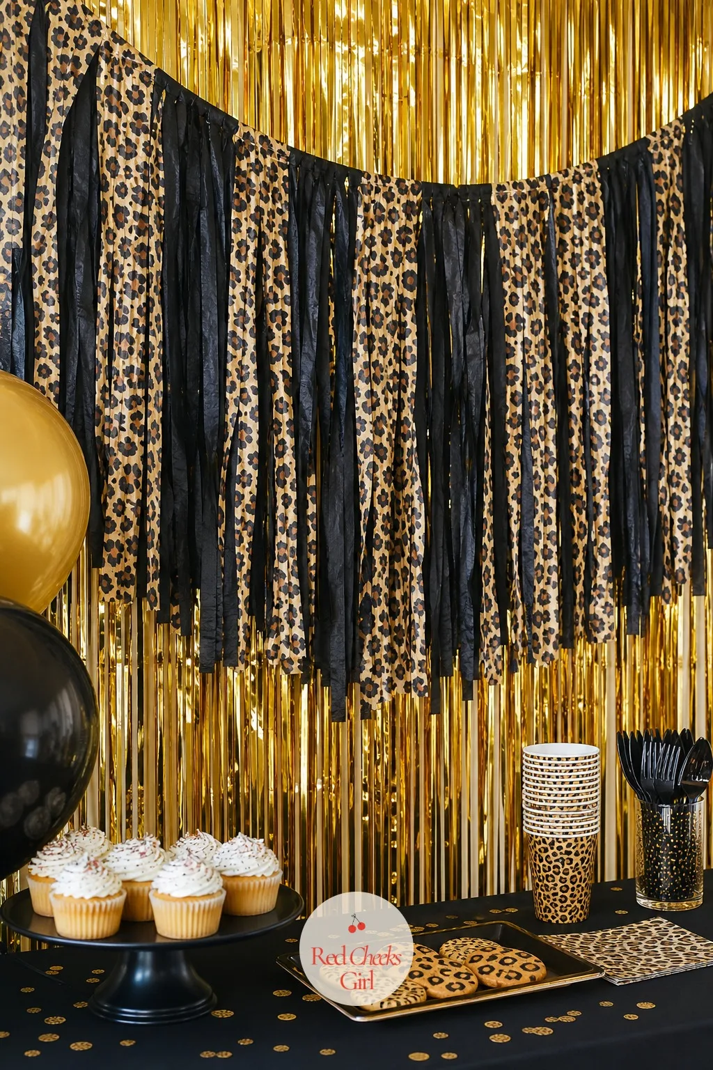 Black and Gold Leopard Fringe Backdrop — For the party that wants to feel grown rather than childish, a balloon arch can read as too much. Cheetah print