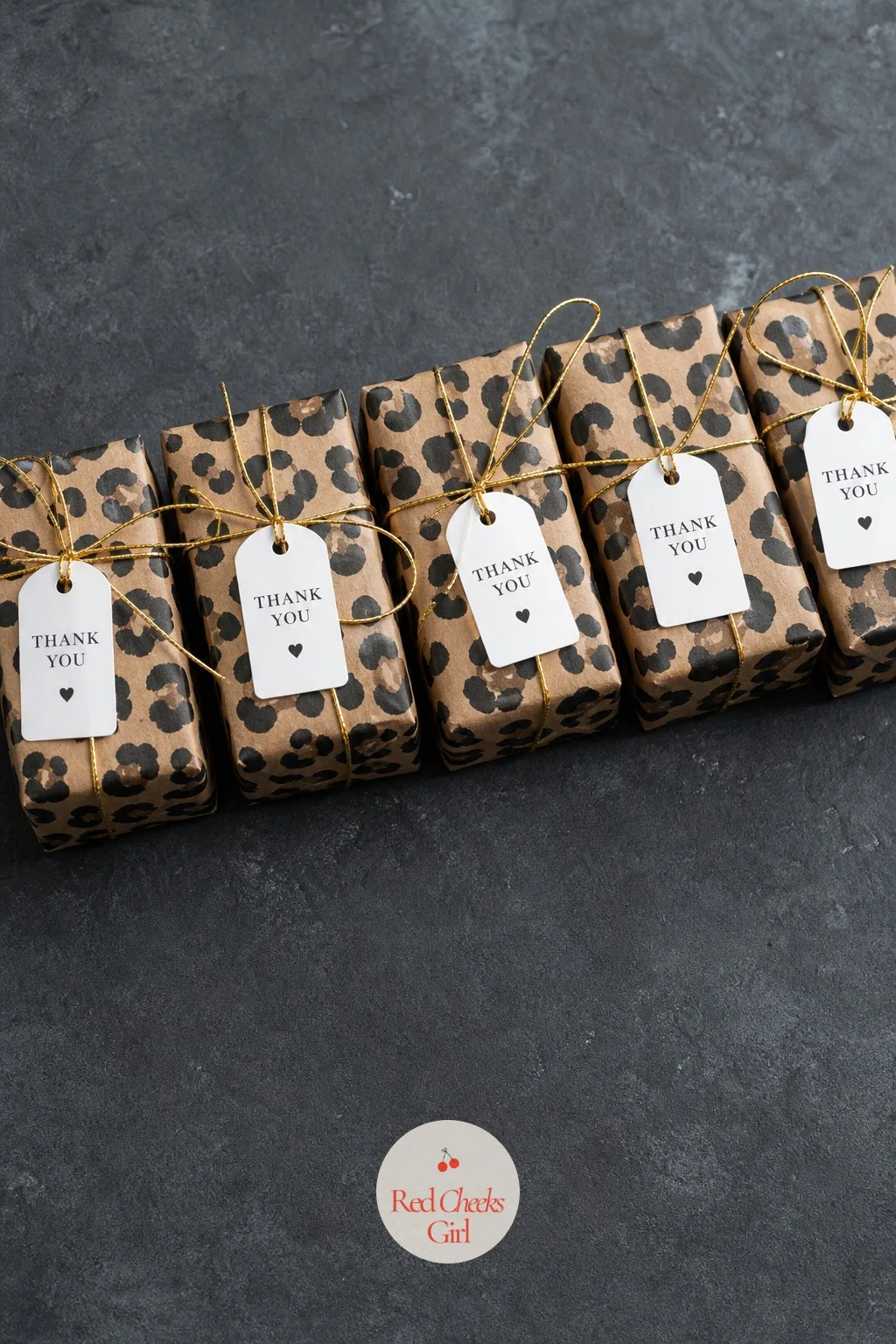 Favor Boxes Wrapped in Animal Print — The last thing in a guest's hand on the way out should not need explaining. Cheetah print birthday party ideas