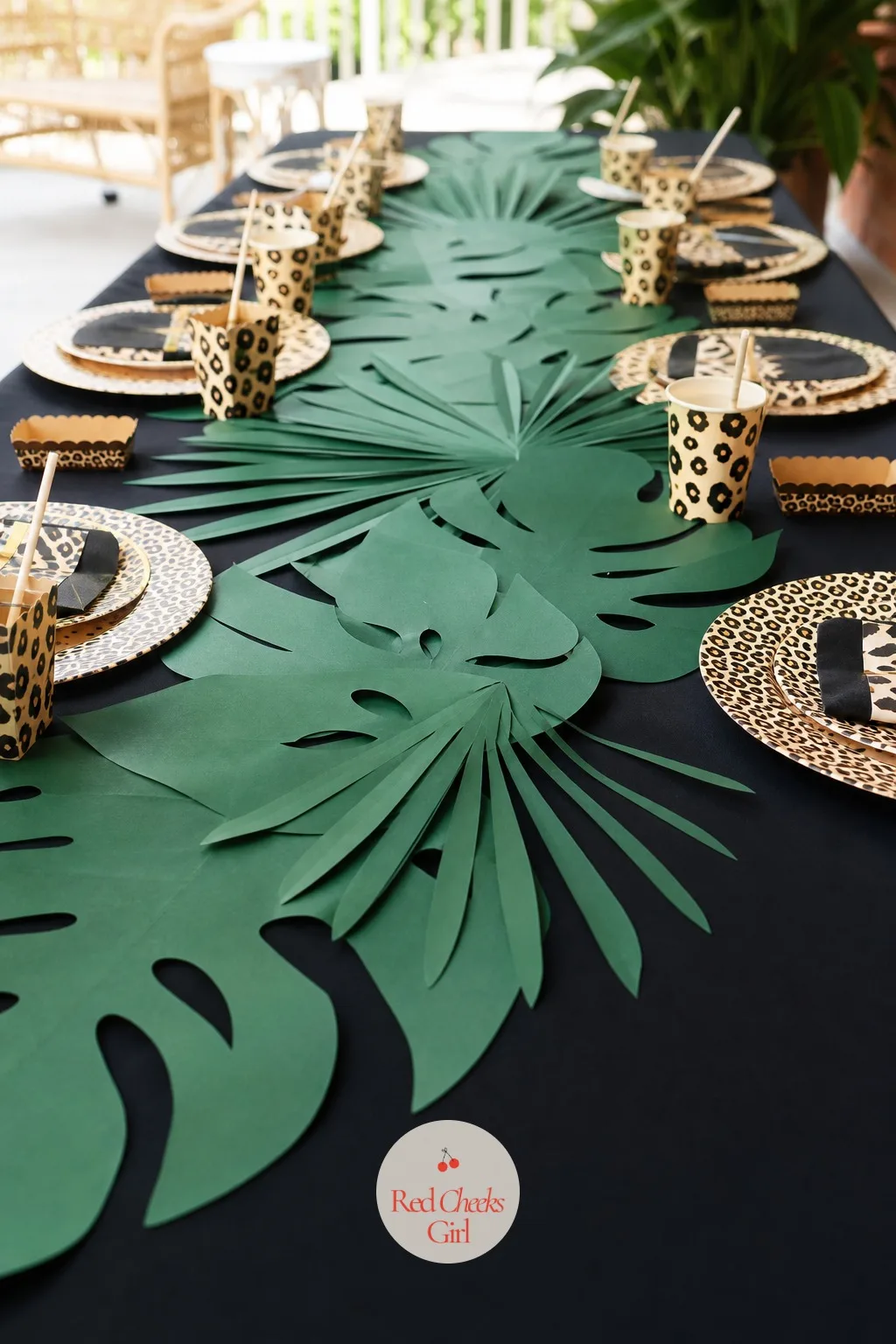 Oversized Paper Palm Leaf Table Runner — The tropical version of this theme needs one thing the black and gold version does not: real scale. Cheetah print
