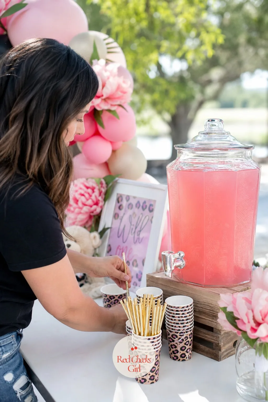 Pink Safari Drink Station — A dessert table without something to drink leaves guests wandering off to find water. Cheetah print birthday party ideas