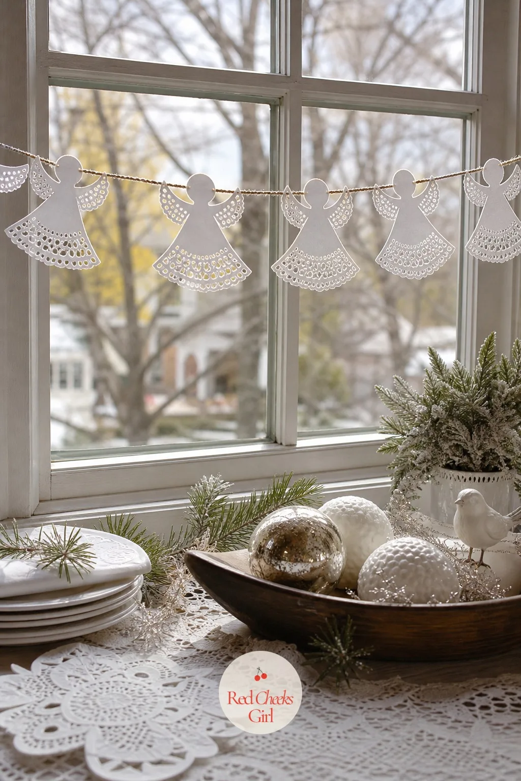 Paper Doily Garland Angels — White against glass does something no other colour does at this time of year, it goes almost translucent. Christmas angel crafts